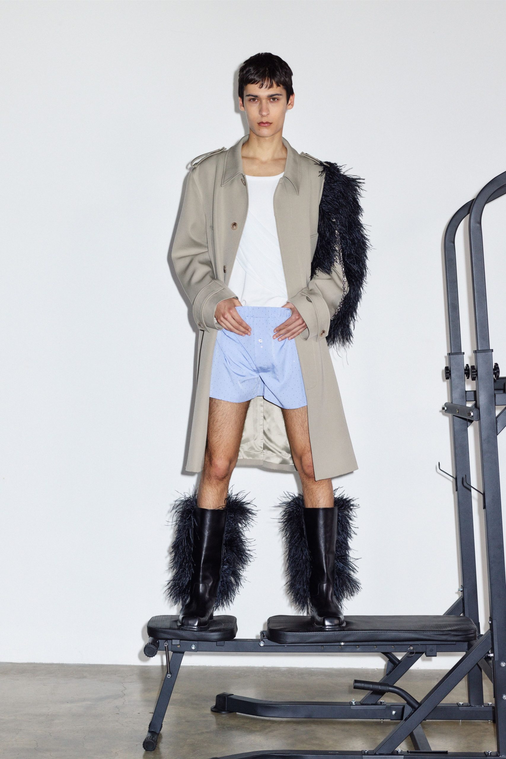 beige wool coat with black boots