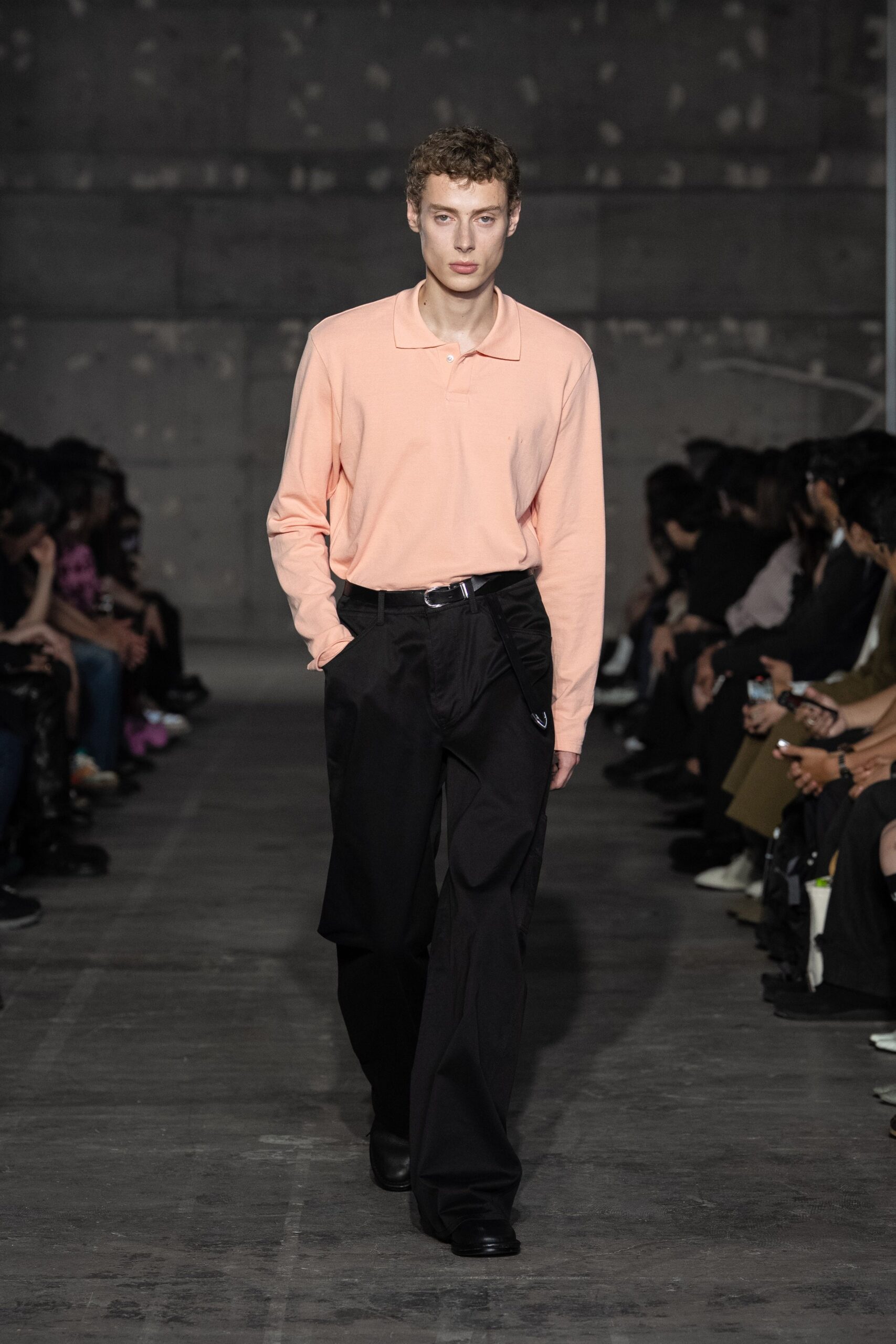 pink collared shirt with black pants