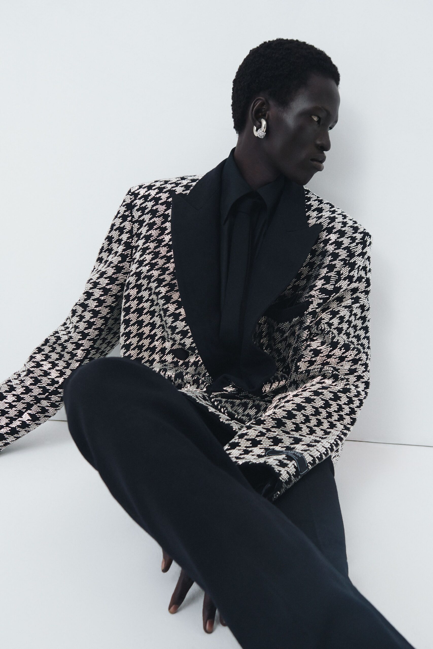 black wool long-sleeve collared structured printed textured blazer