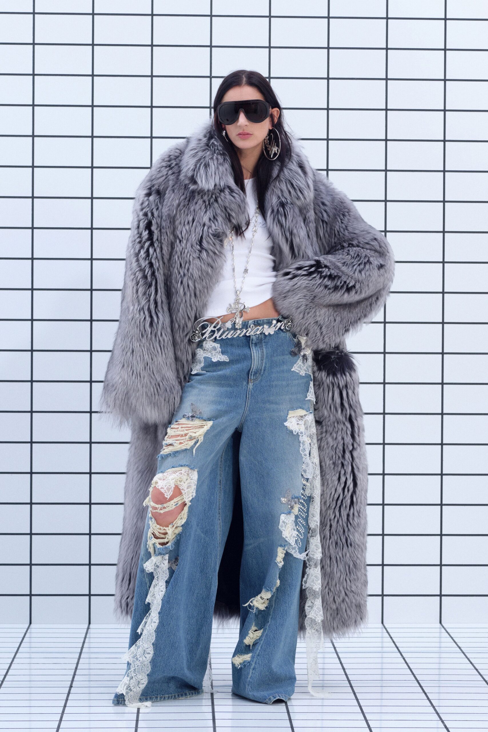 gray faux-fur coat with distressed jeans