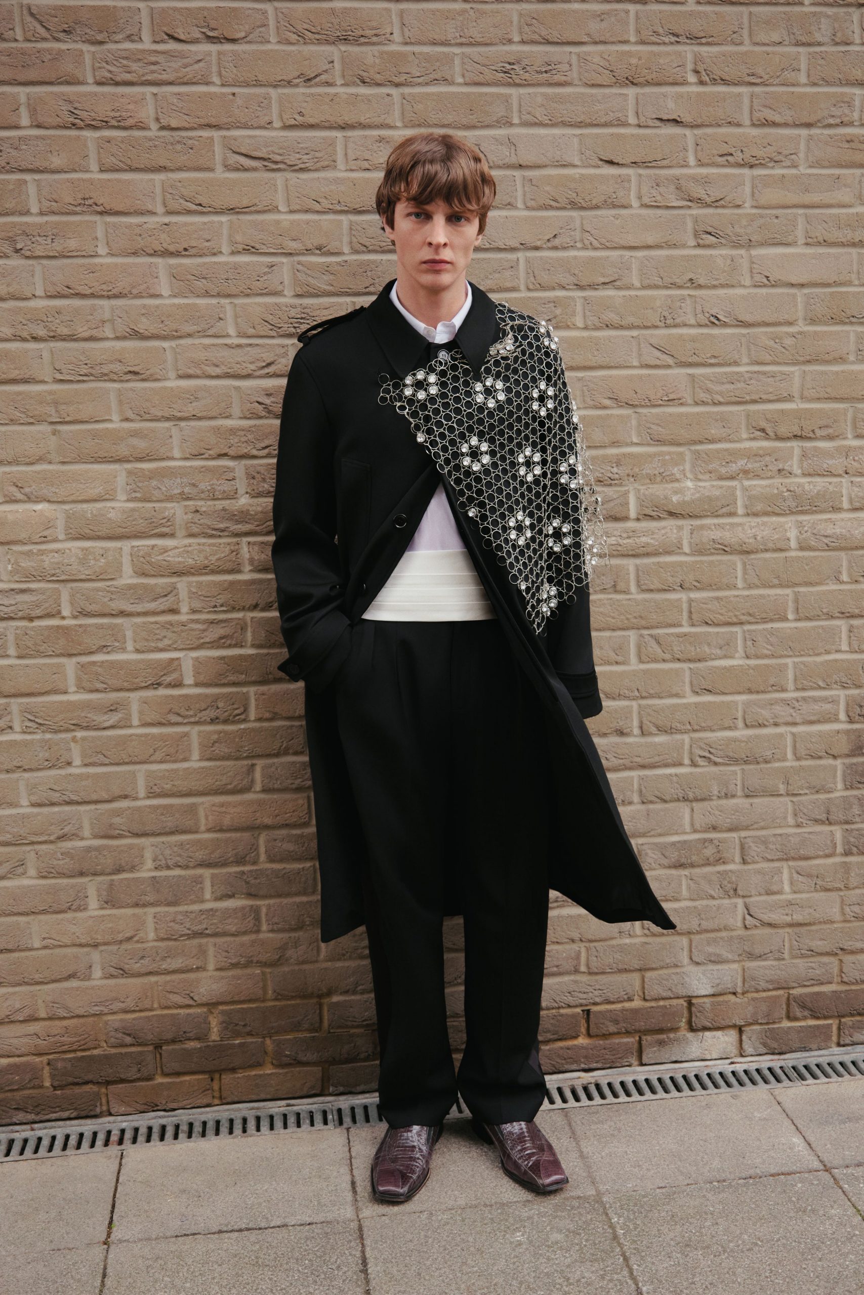 black wool coat and tailored pants