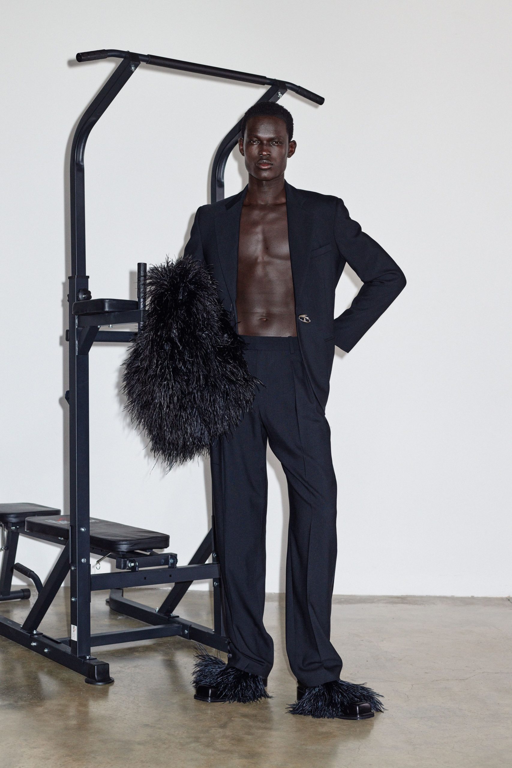 black tailored suit with fur accessories