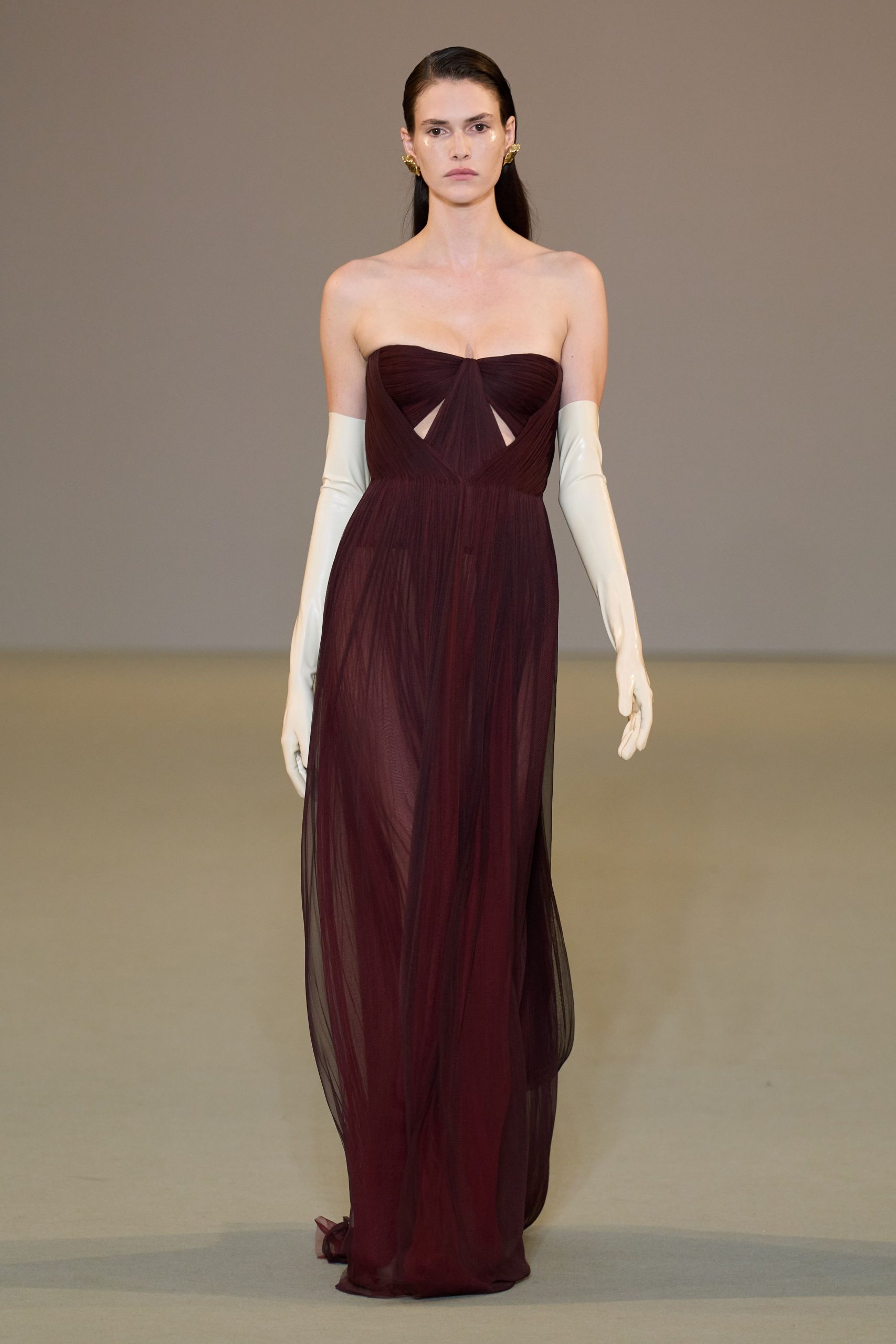 maroon silk strapless cutout fitted draped flowing gown