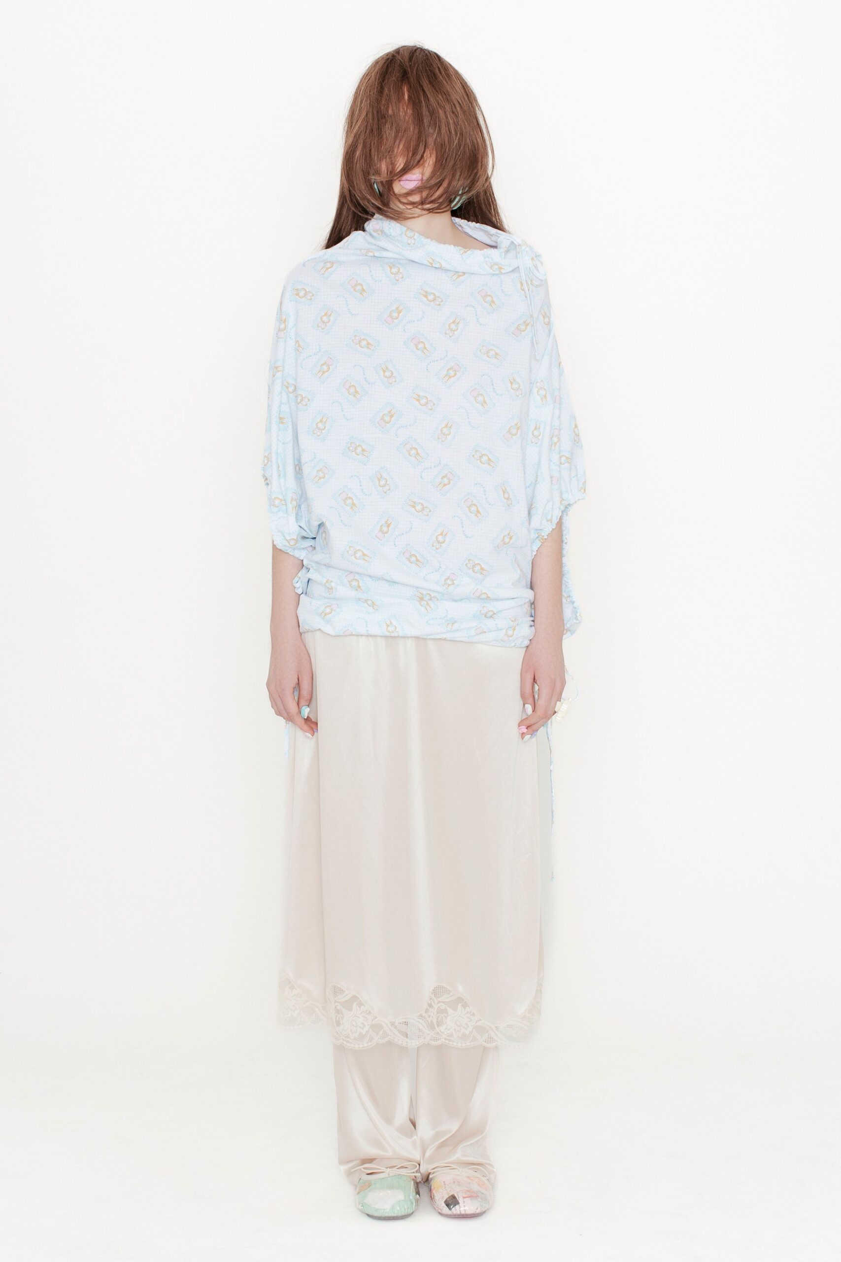 blue printed relaxed top and beige maxi skirt