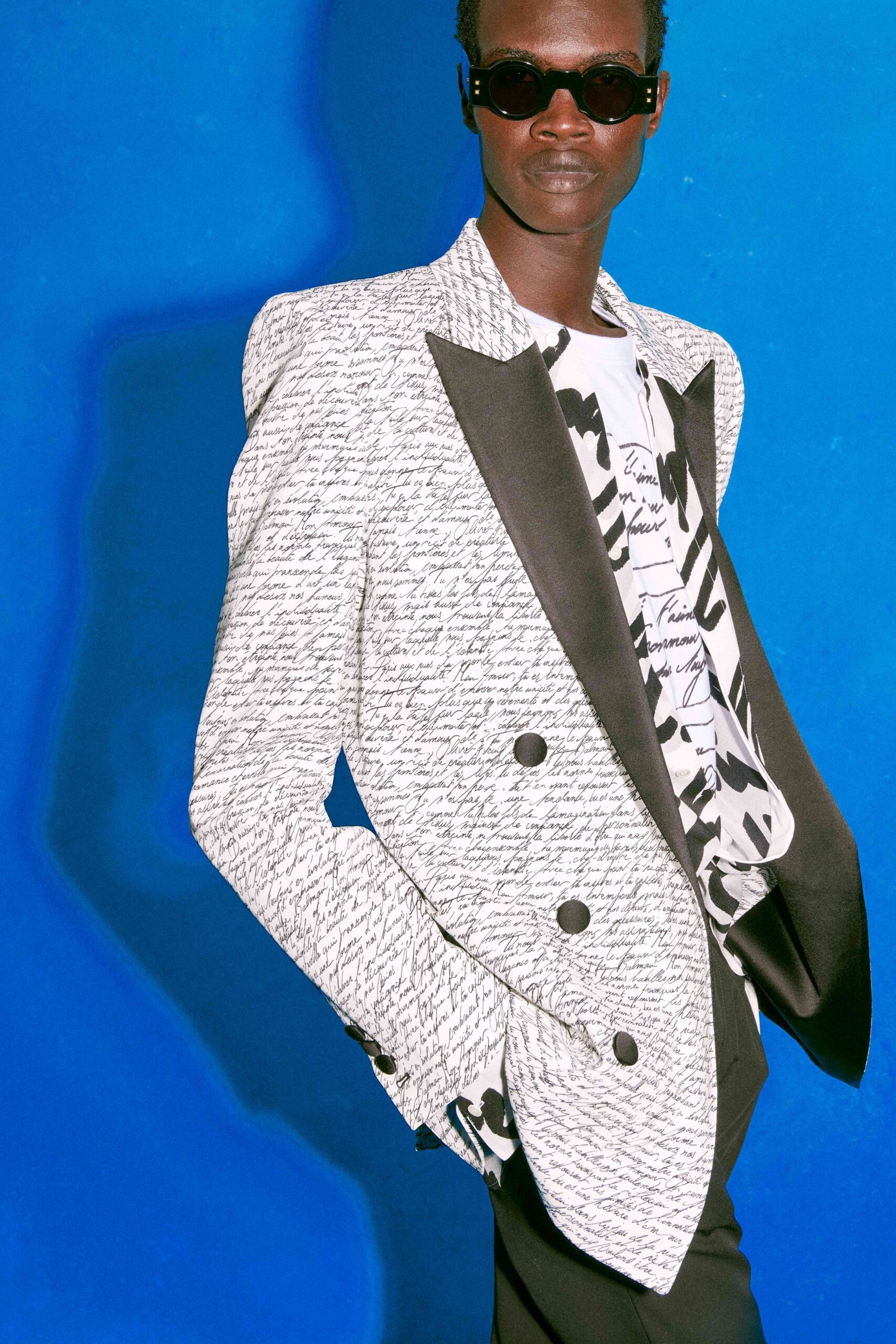 black cotton long-sleeve collared structured printed blazer