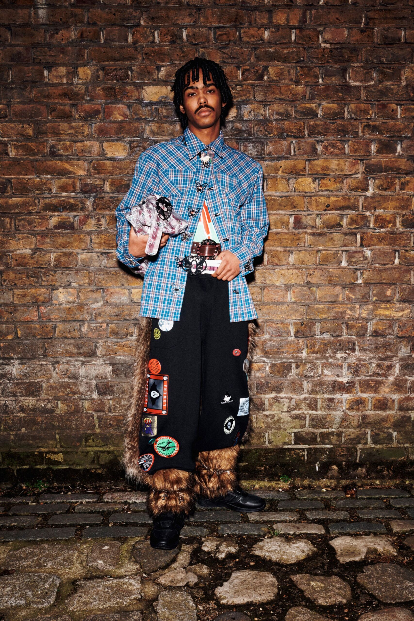 blue checked shirt black cargo pants