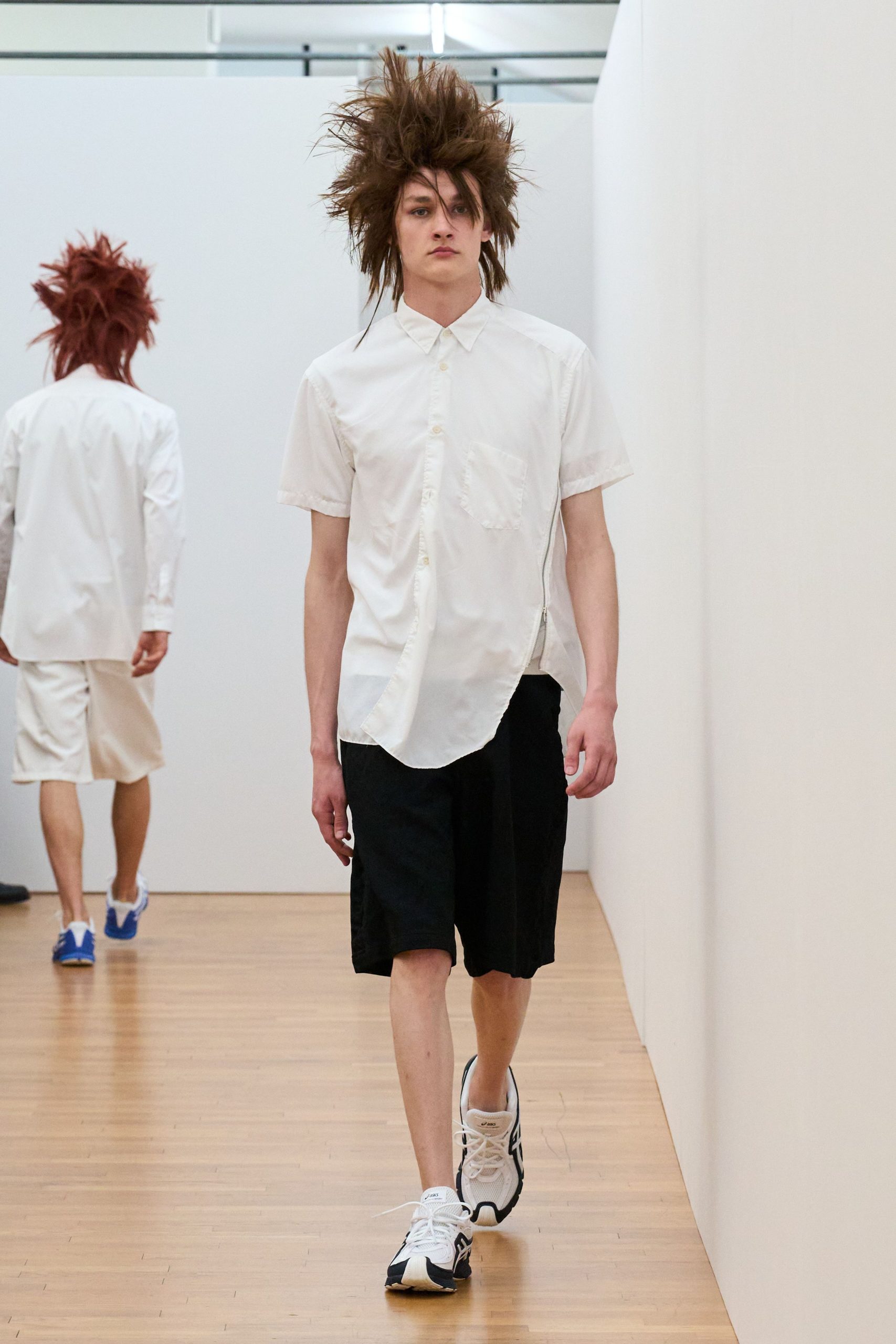 white shirt black shorts
