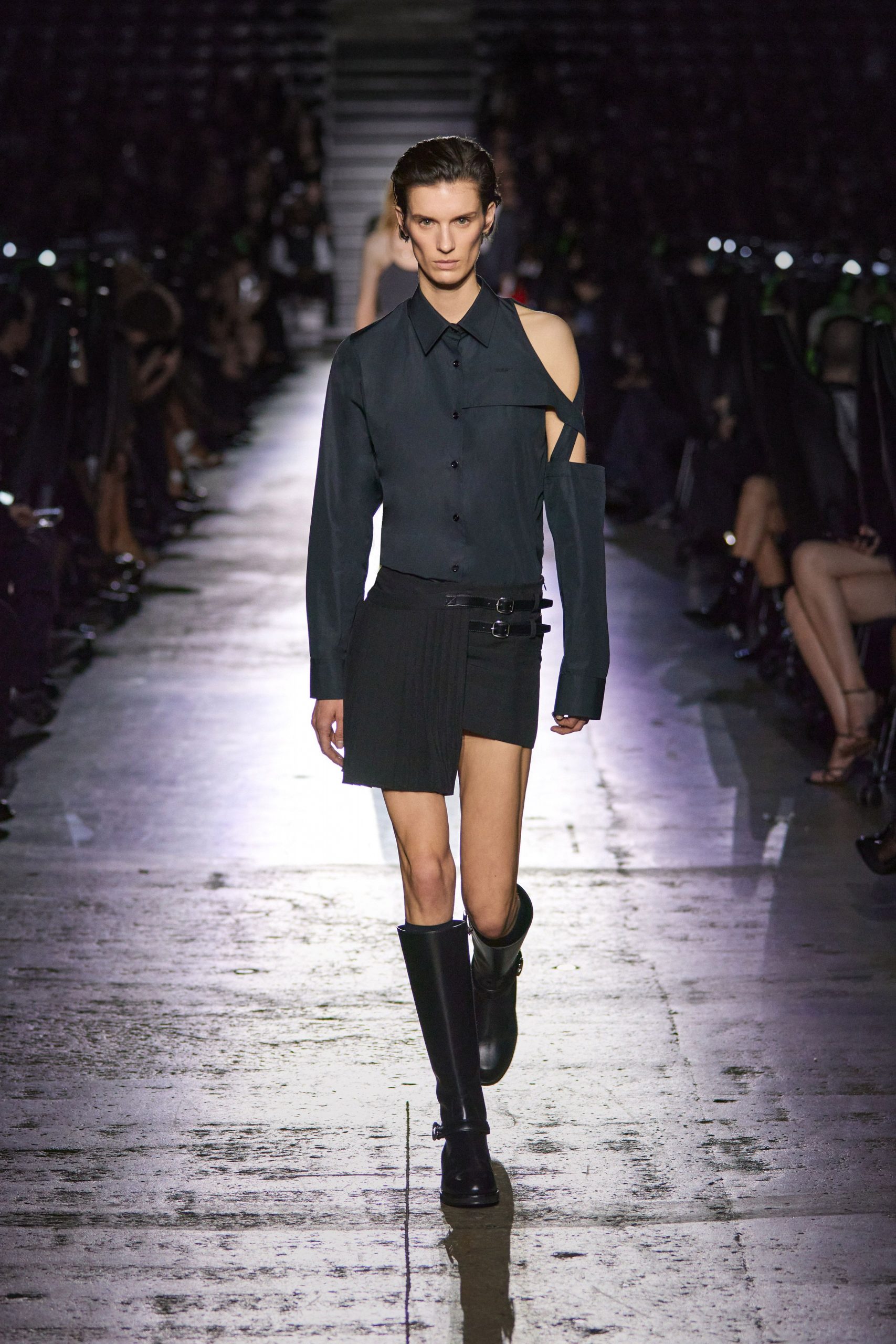 black fitted shirt and mini skirt