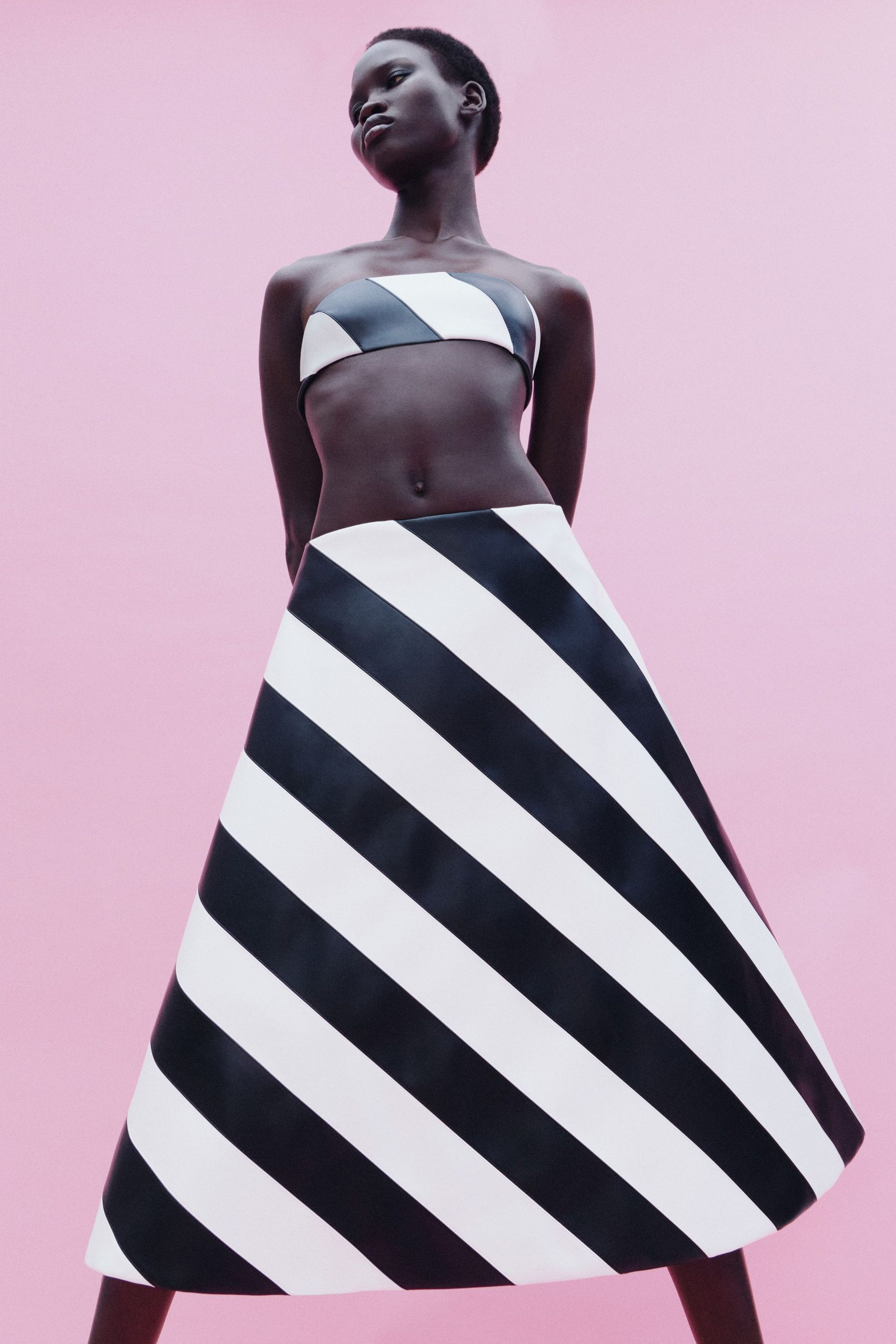 black leather sleeveless high-neck fitted striped cropped crop-top