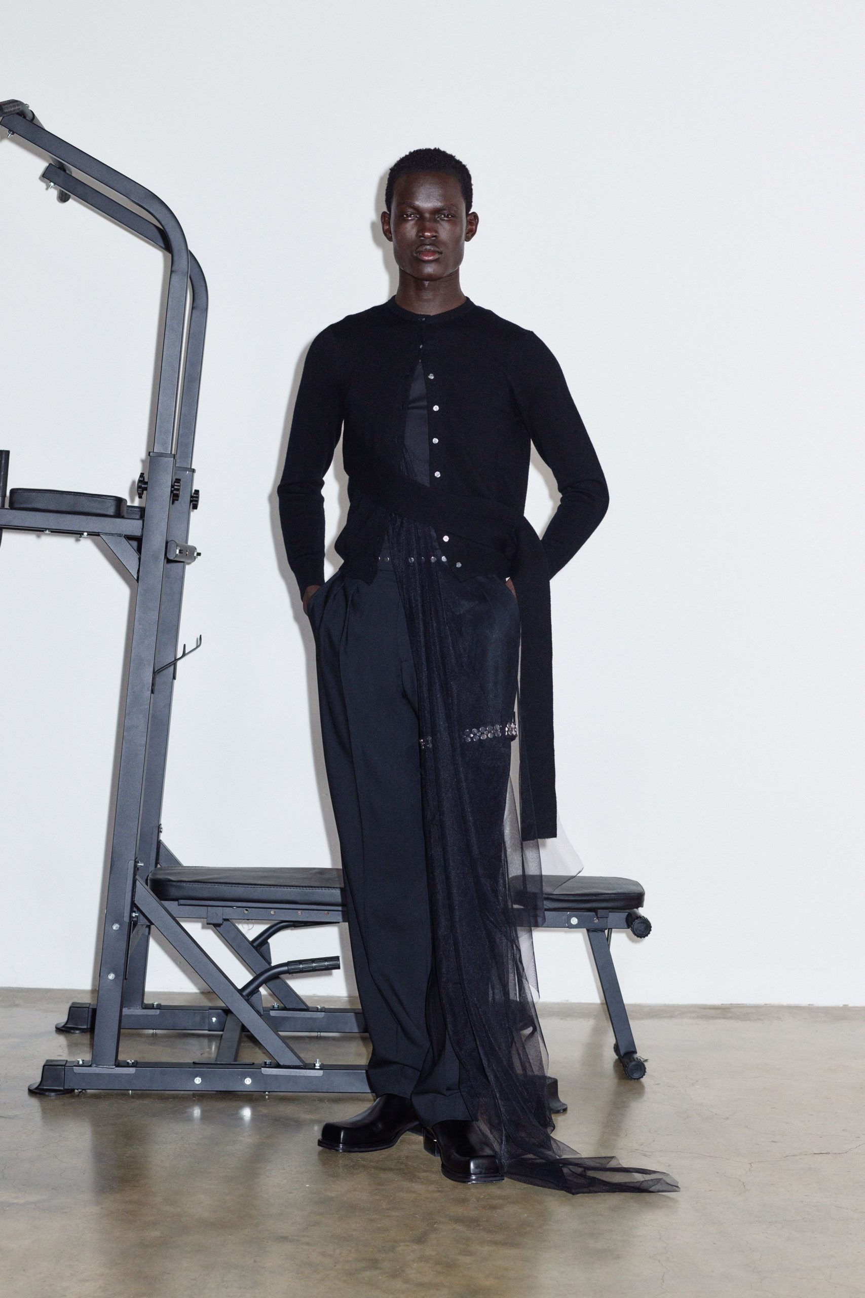 black fitted shirt and relaxed pants