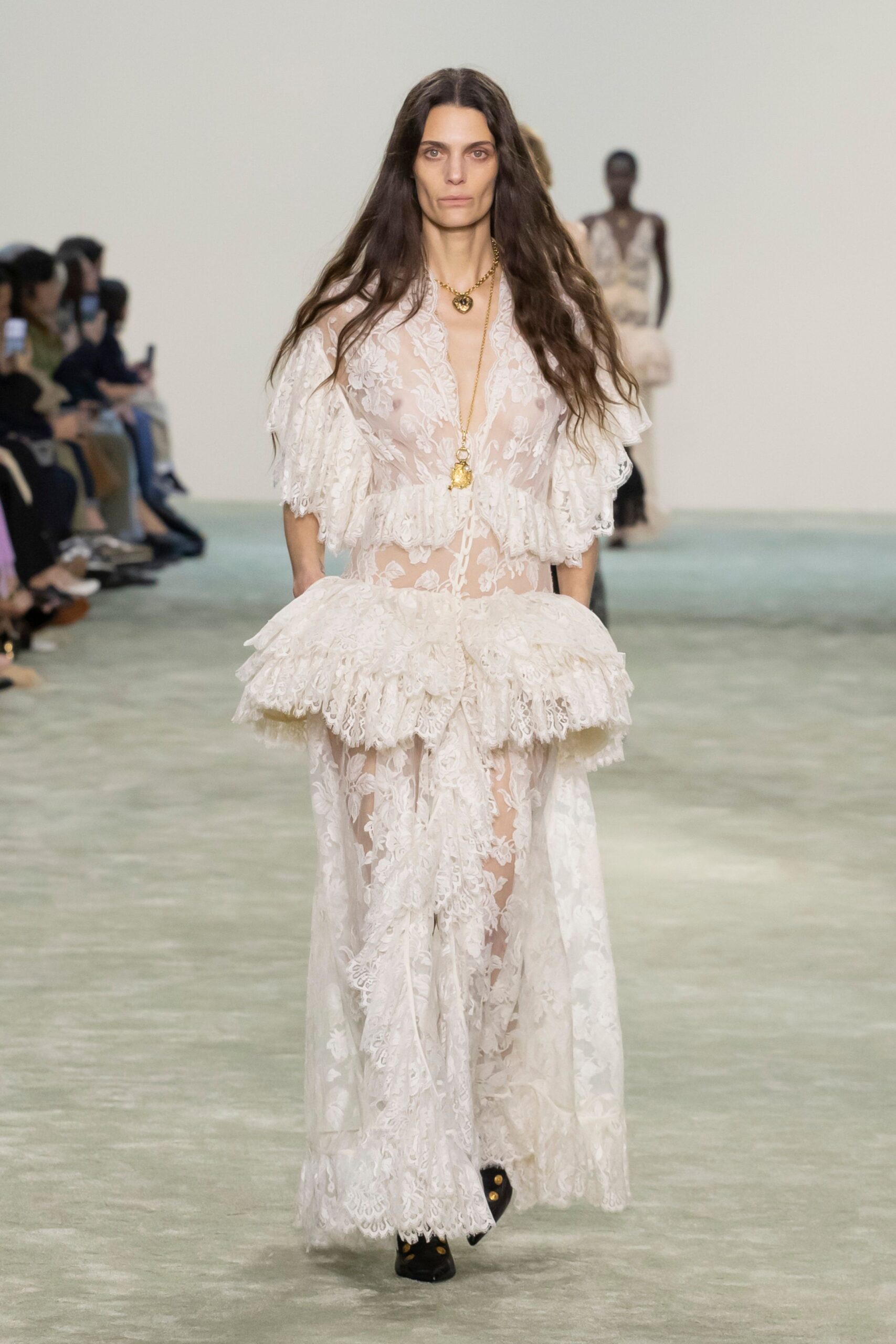 white lace ruffled gown