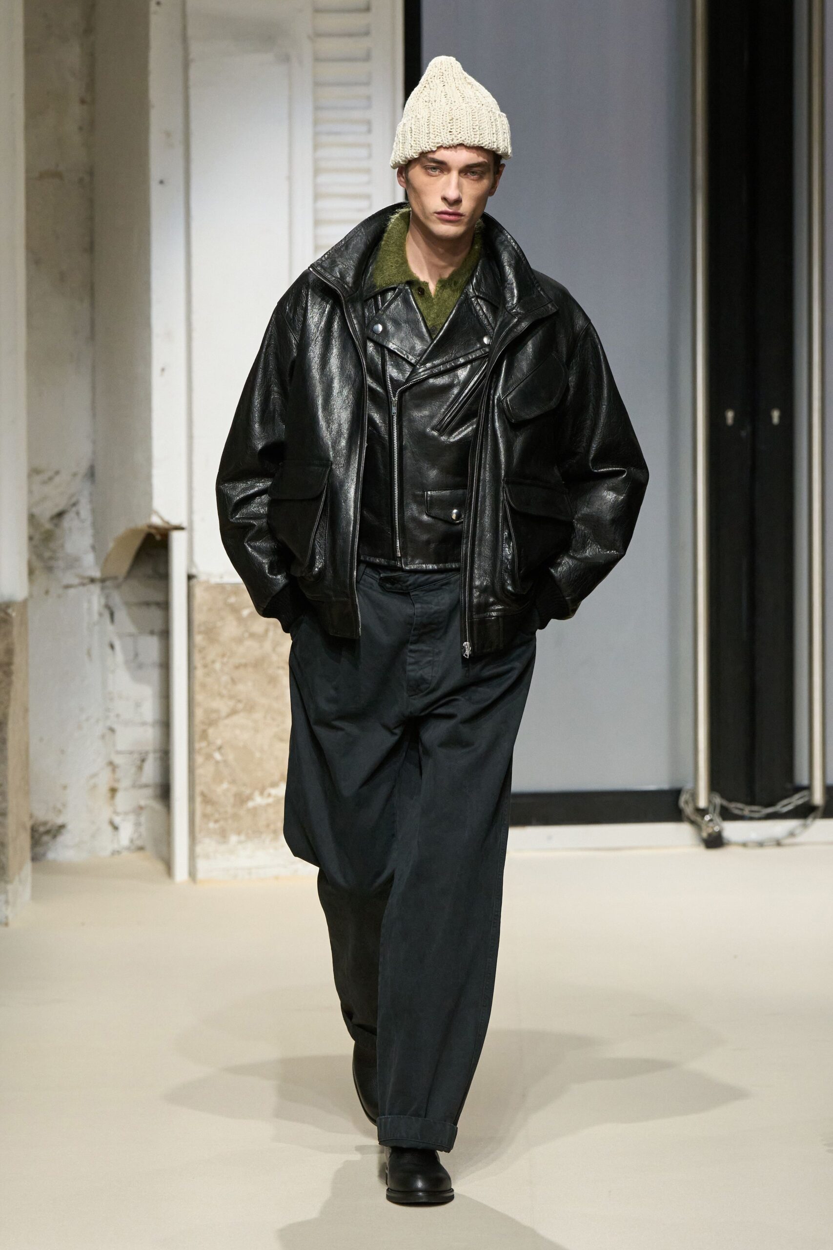 black leather jacket with green shirt