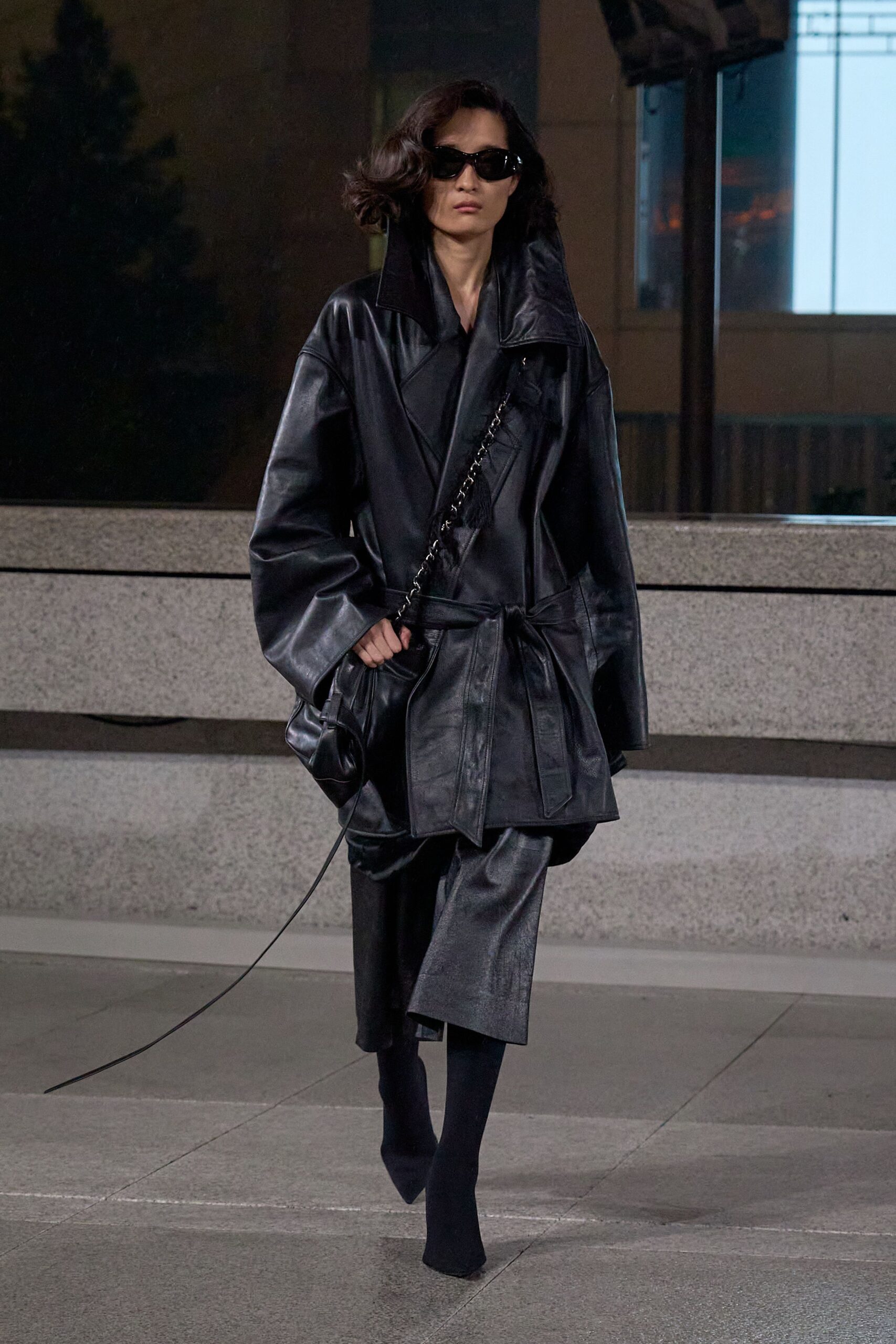 black leather long-sleeve collared oversized belted coat