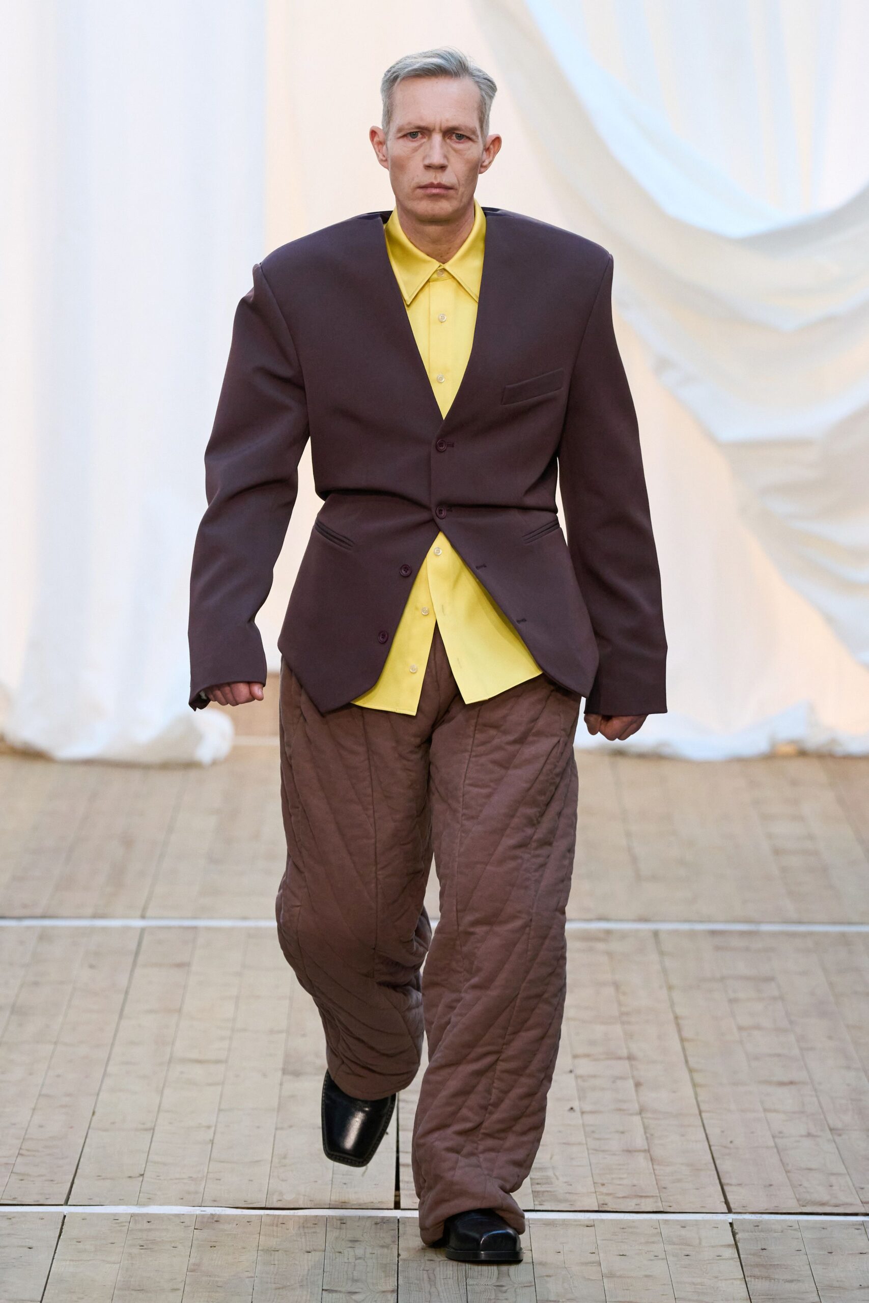 brown structured blazer with yellow shirt