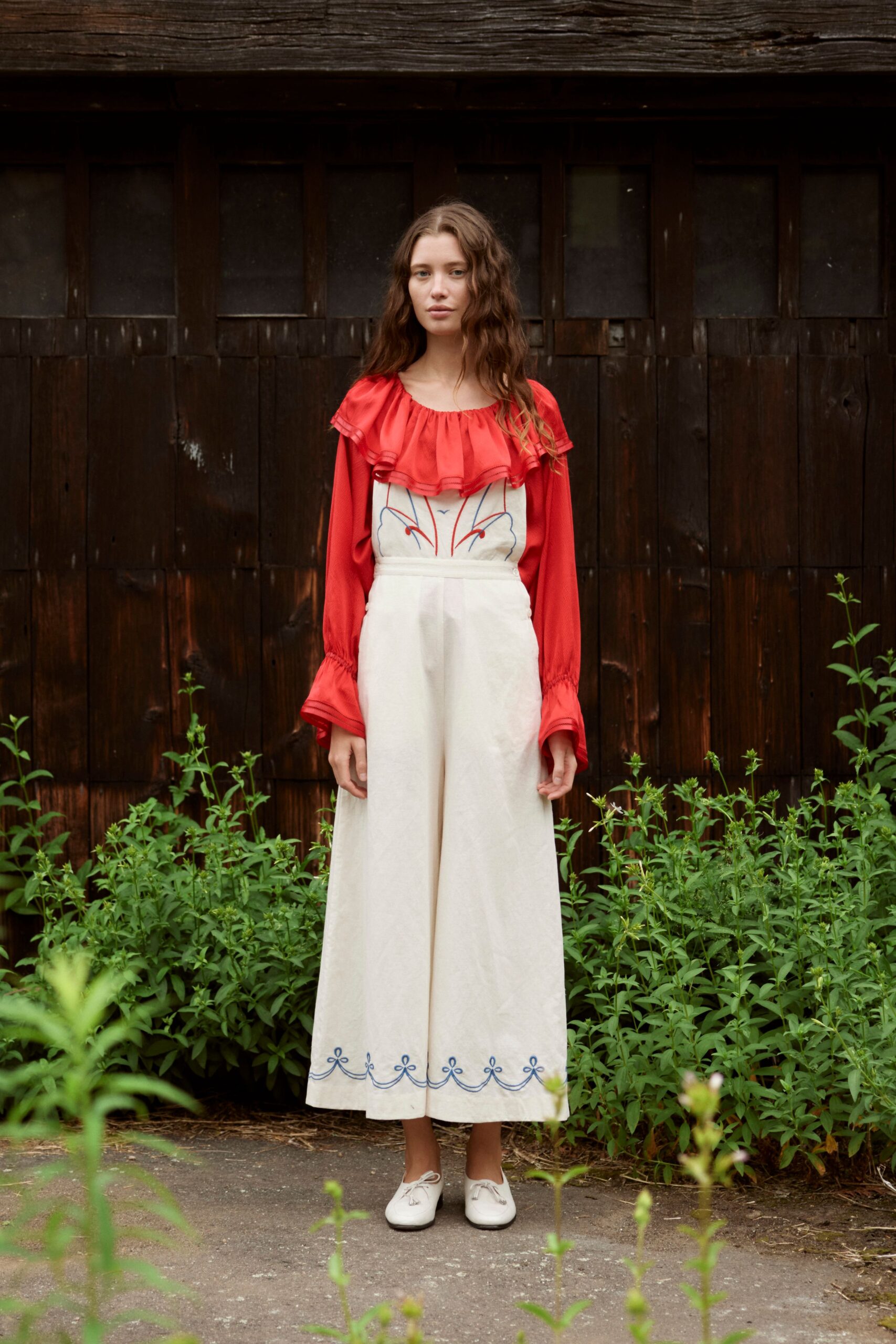 red long-sleeve off-shoulder fitted ruffled top