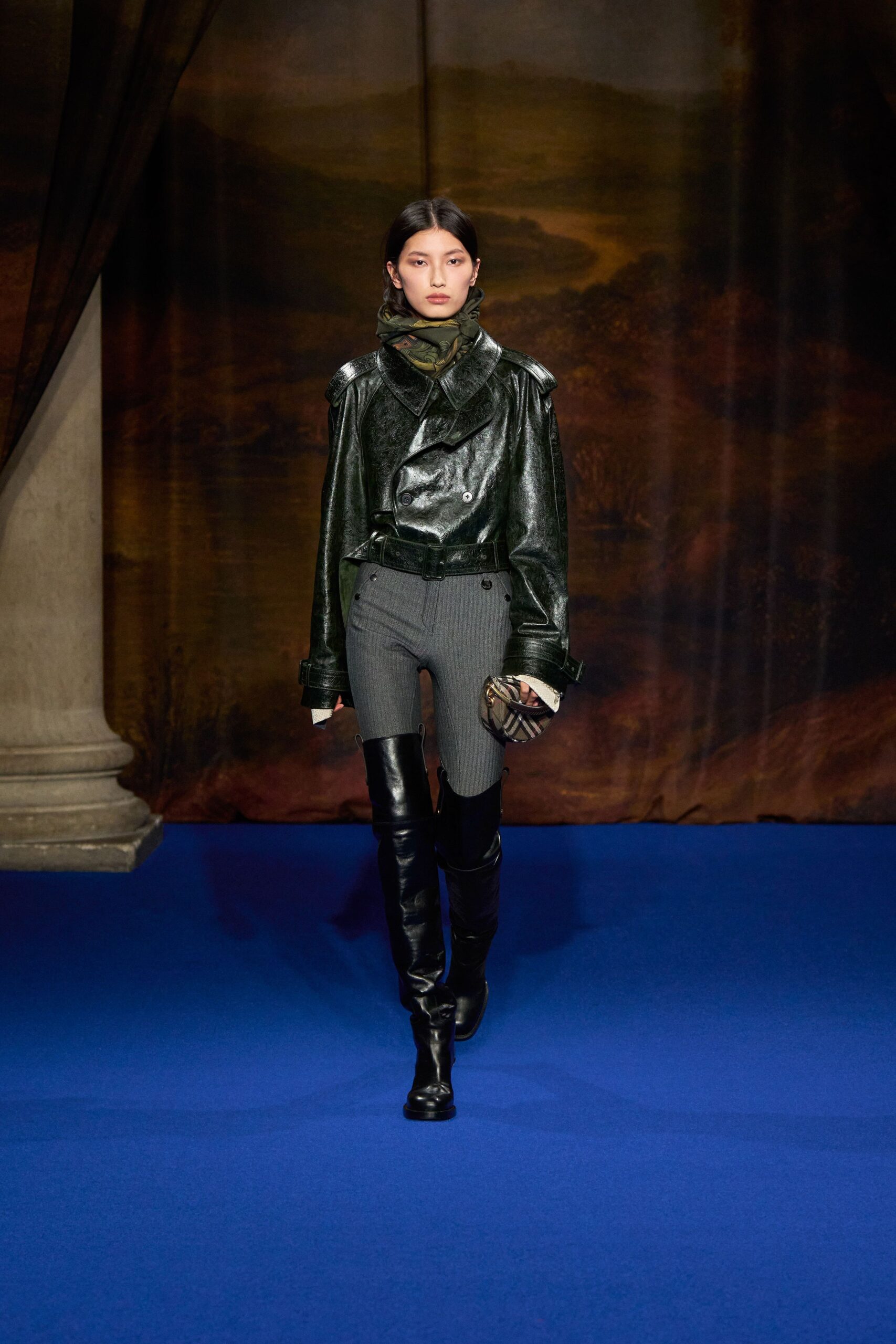 black leather jacket with gray pants