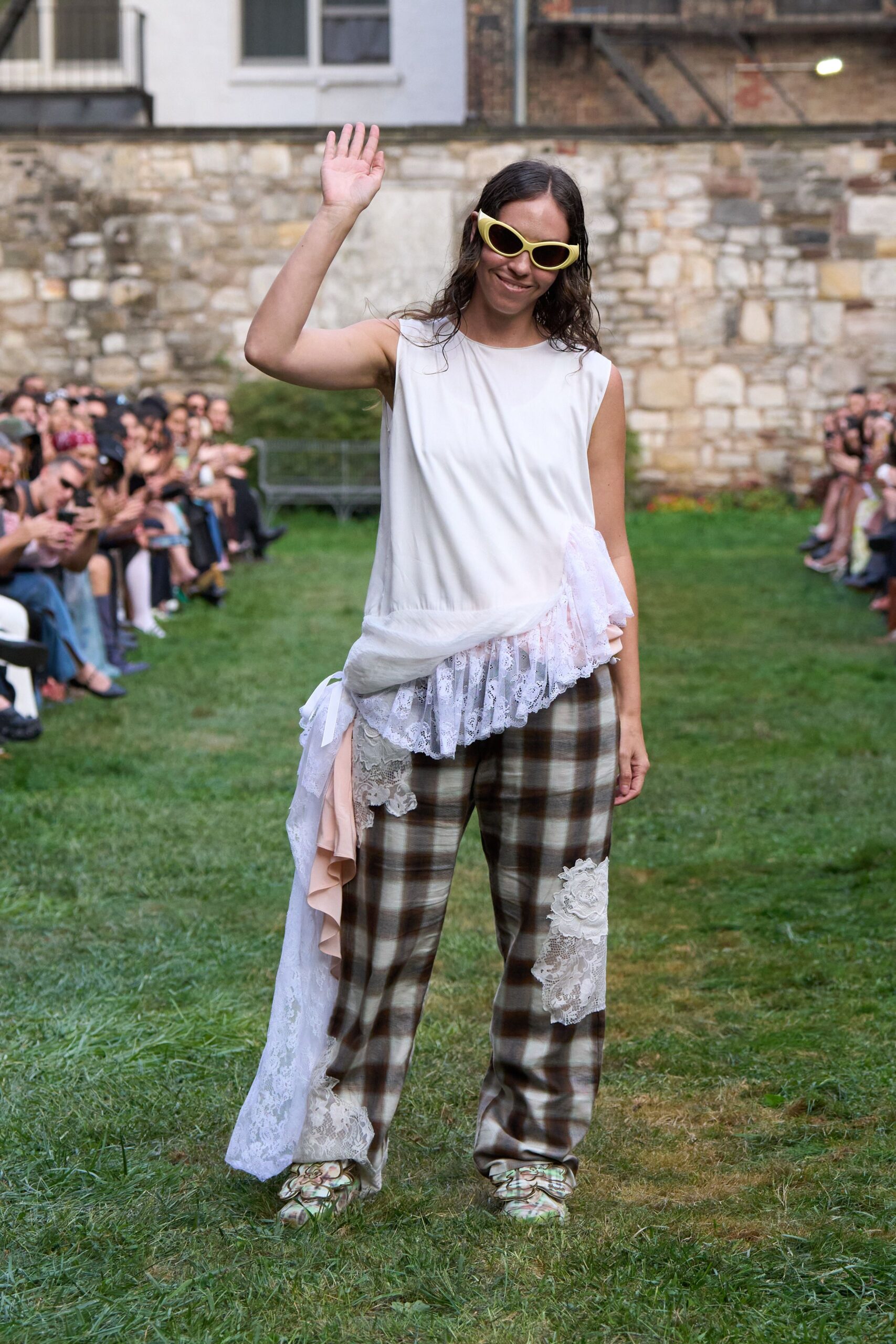 relaxed white top with checked pants