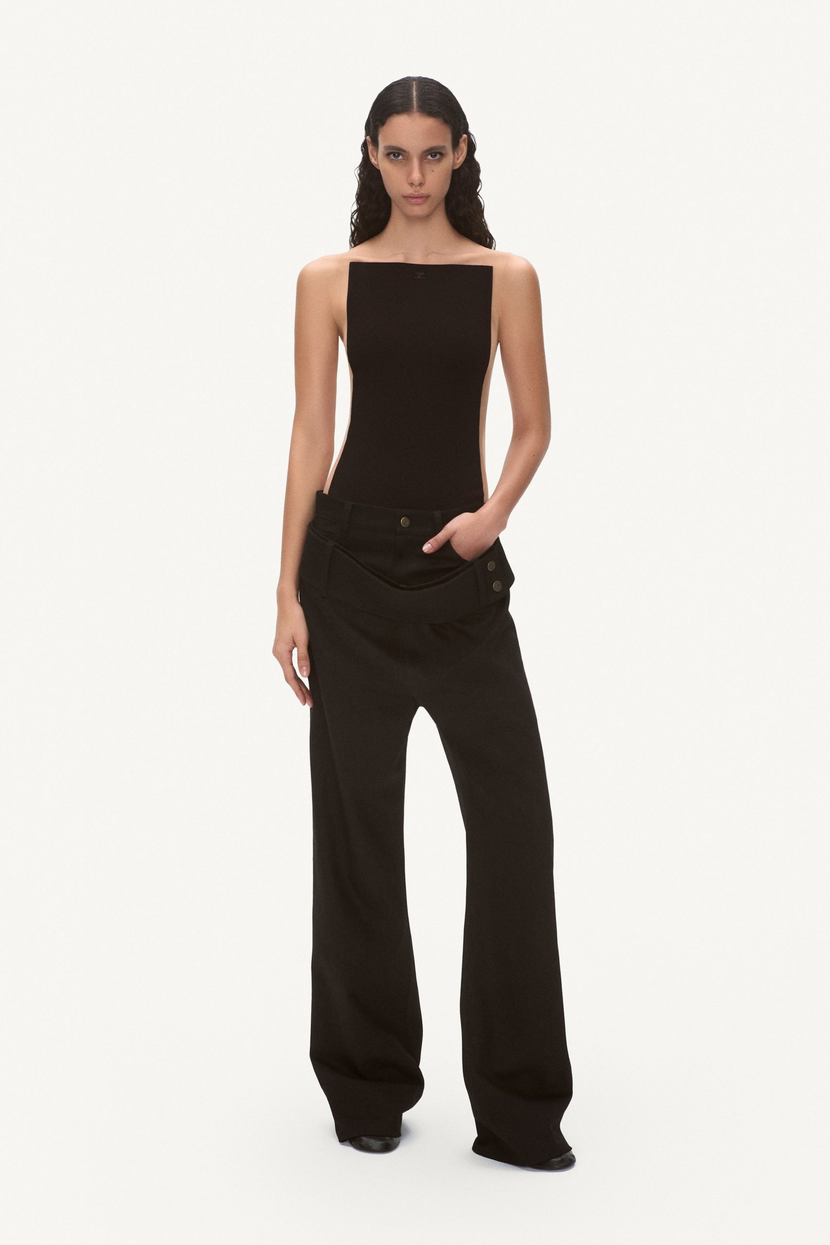 black fitted top and relaxed pants