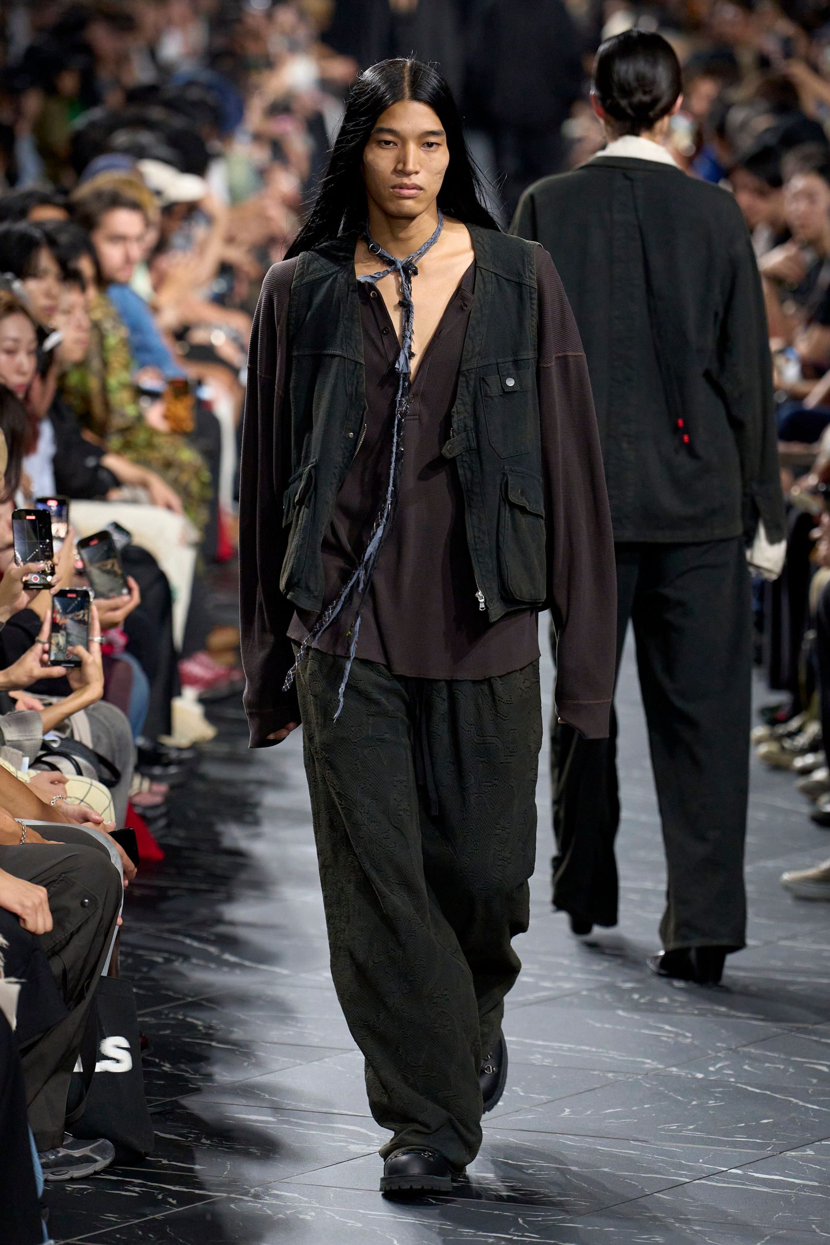 black relaxed vest with brown shirt
