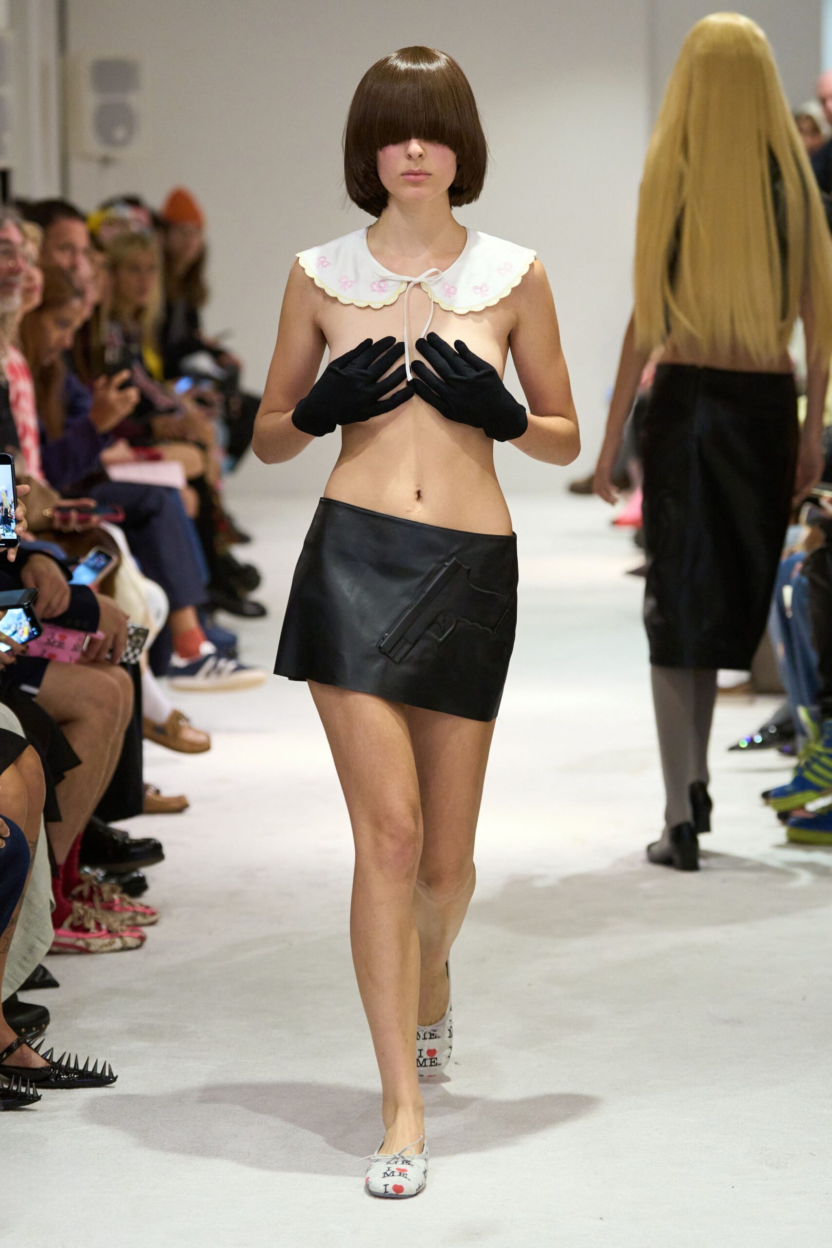 white collared top black mini skirt