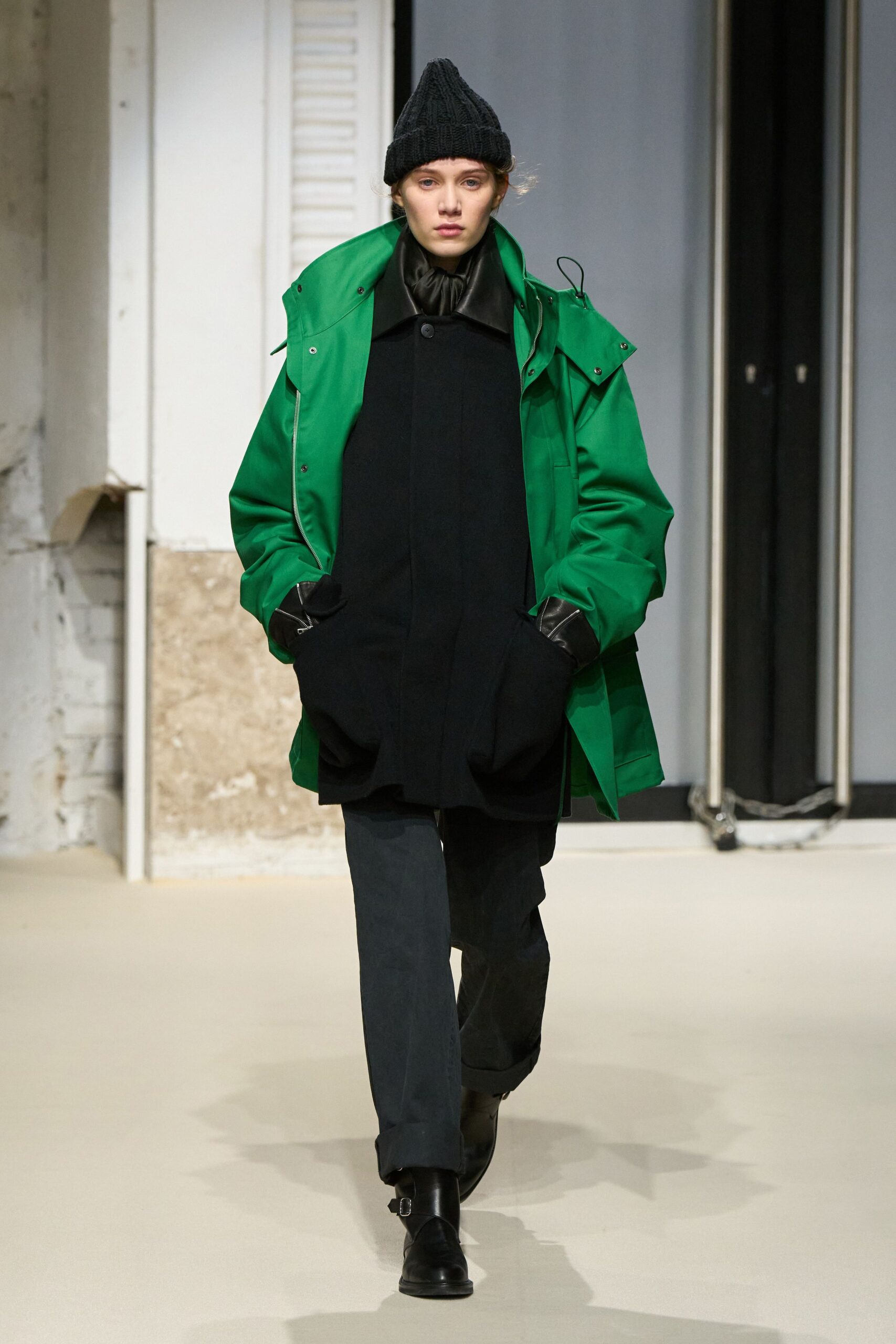green and black layered coats