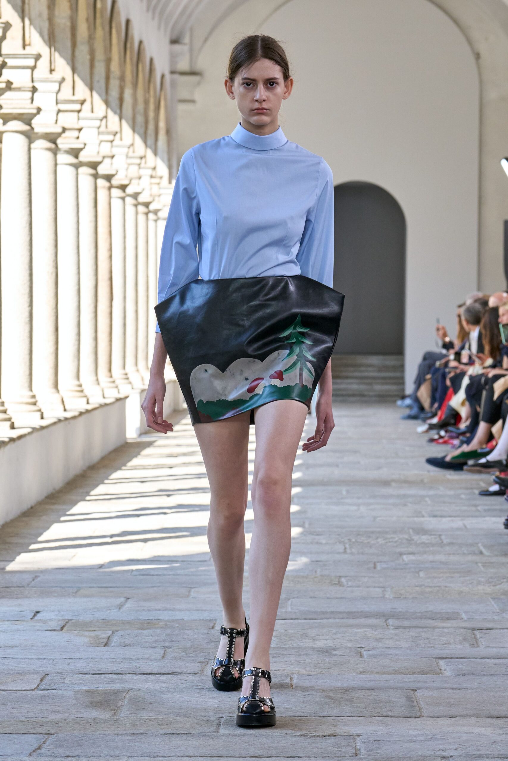 blue fitted top black mini skirt