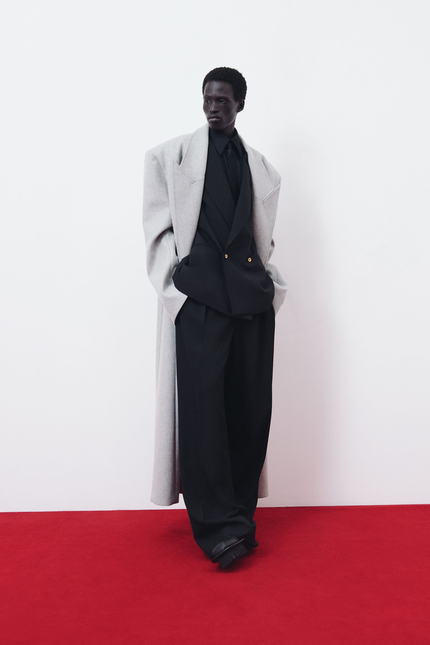 black wool long-sleeve collared oversized structured buttoned blazer