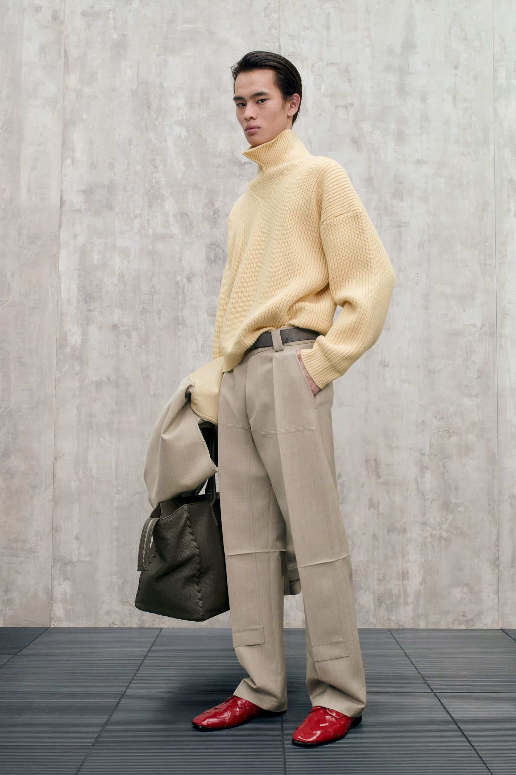 yellow oversized sweater with beige pants