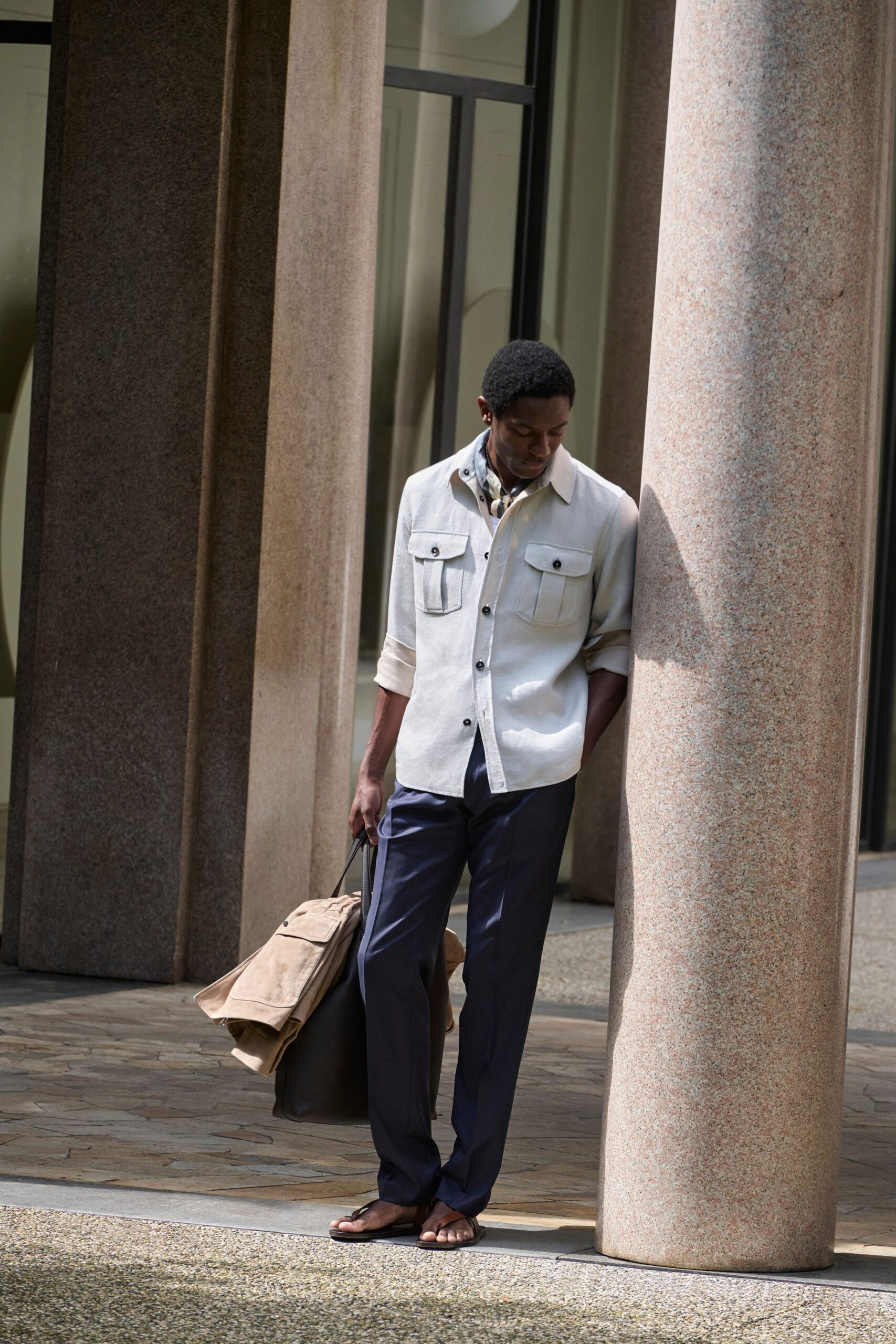 beige shirt navy pants brown shoes