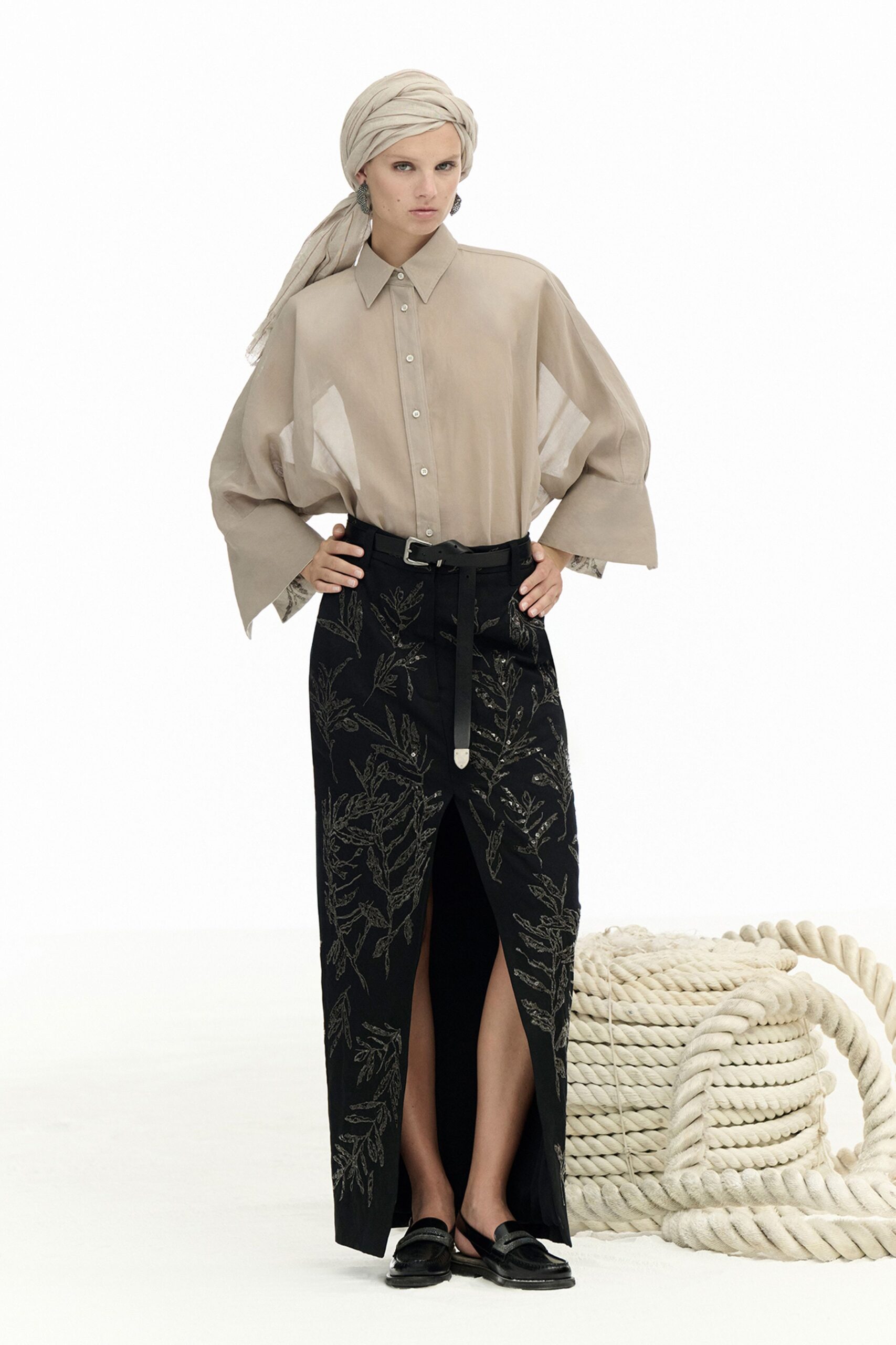 beige shirt black embroidered skirt