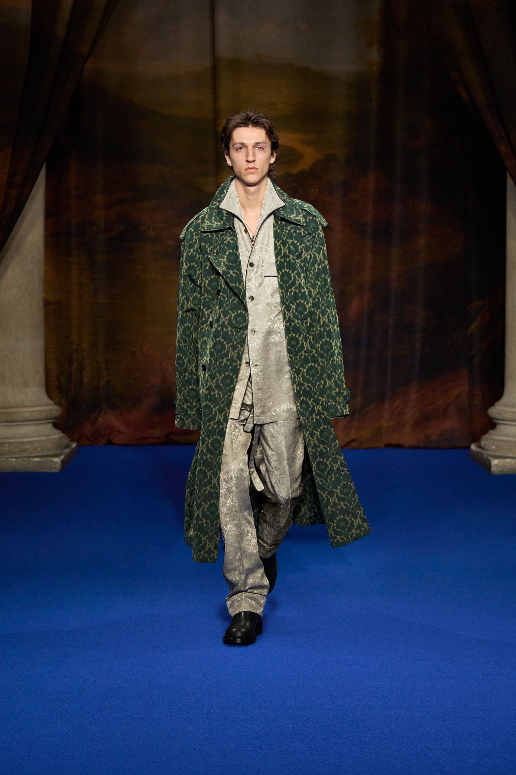 green printed coat with silver pants