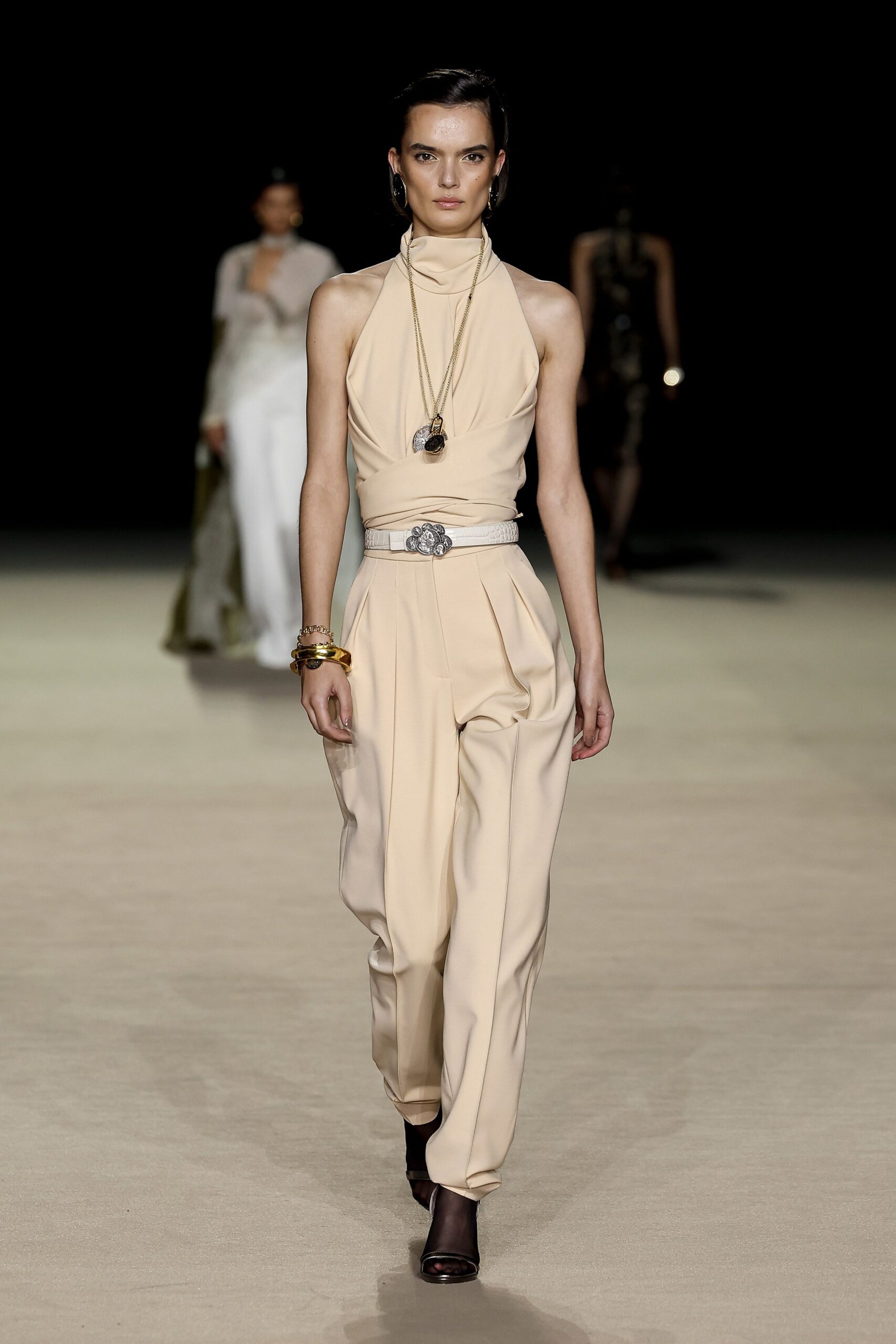 beige fitted top and relaxed pants
