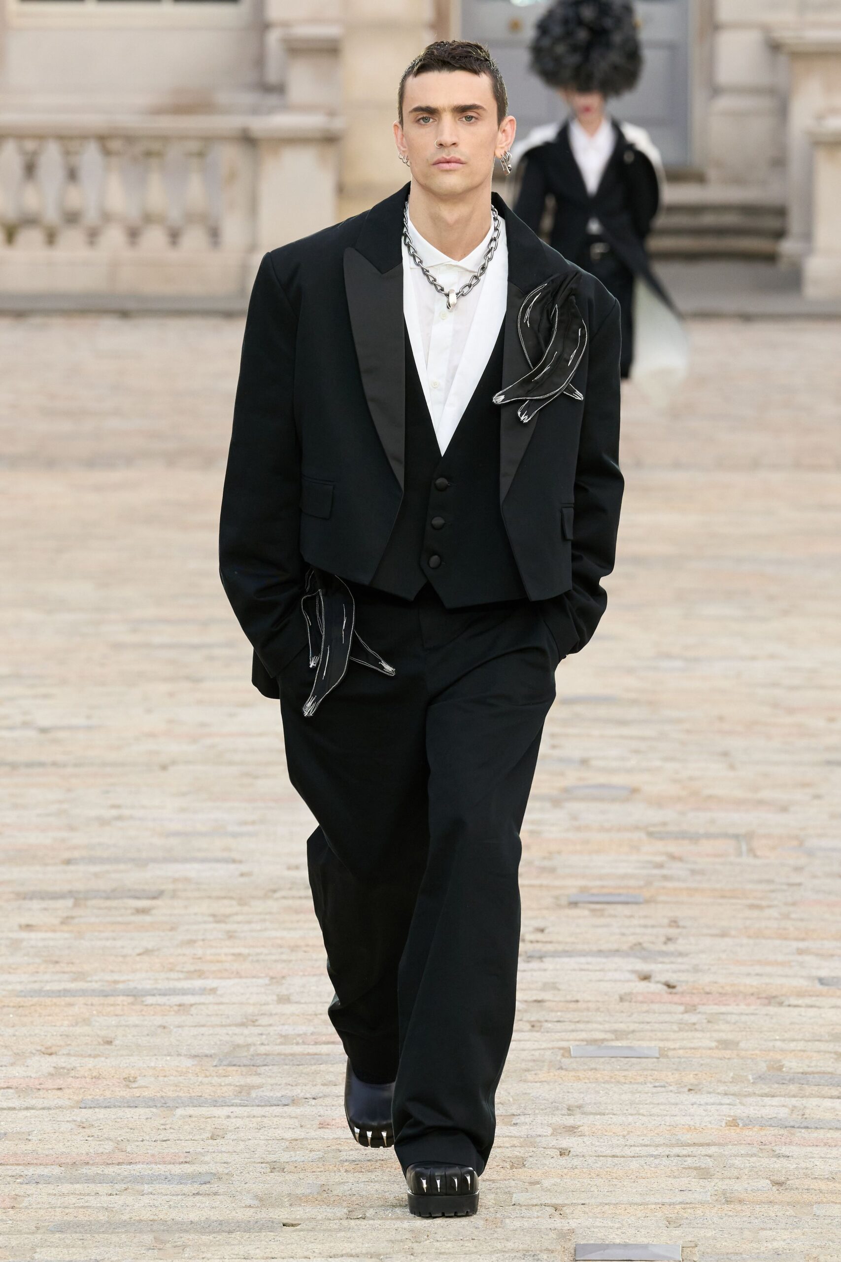 black tailored suit with white shirt