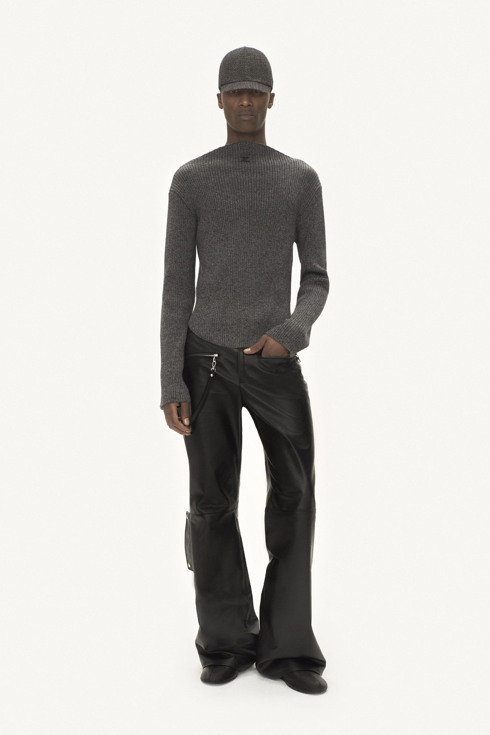 gray fitted top with black flared pants