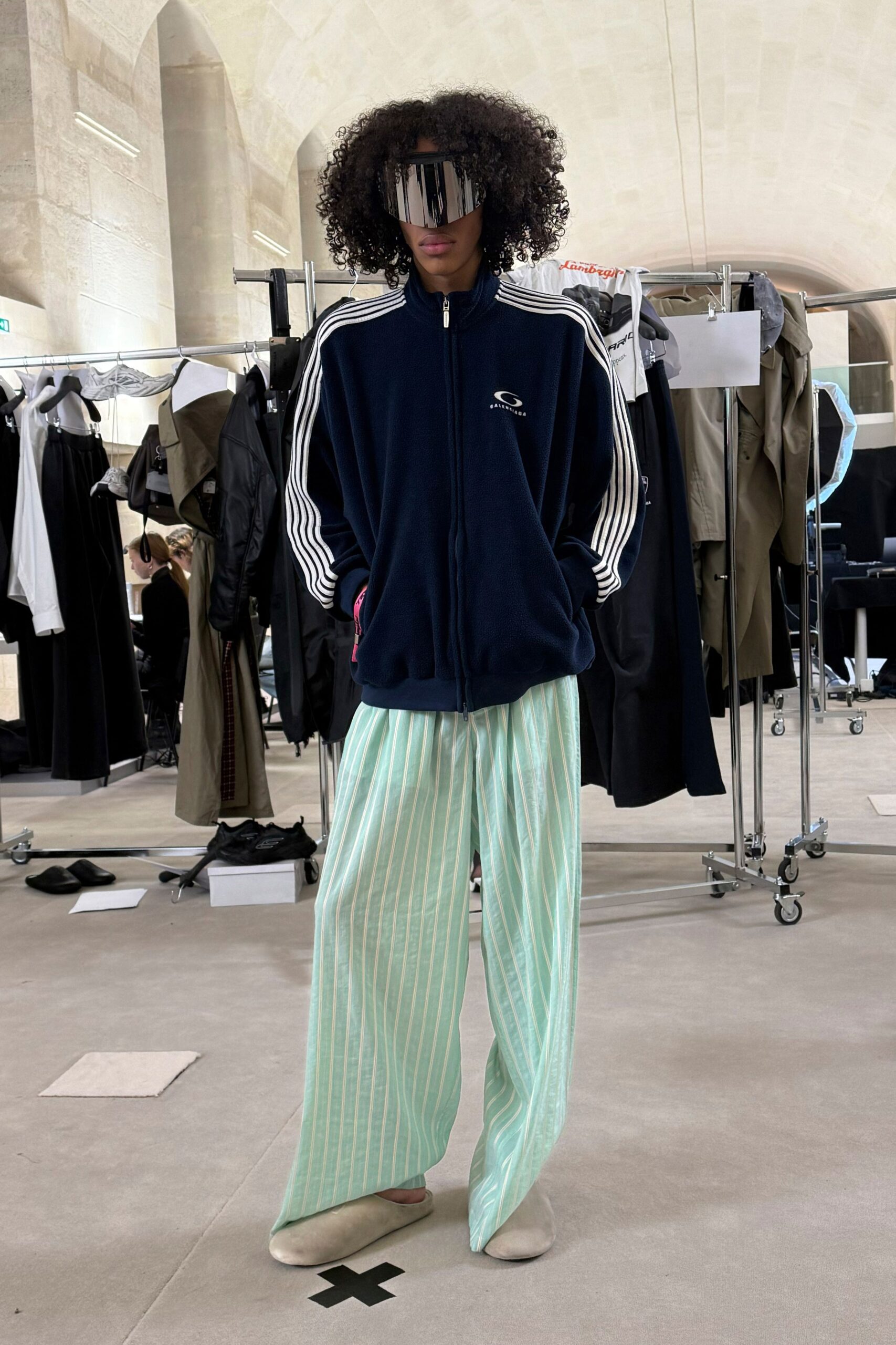 blue fleece jacket with striped pants