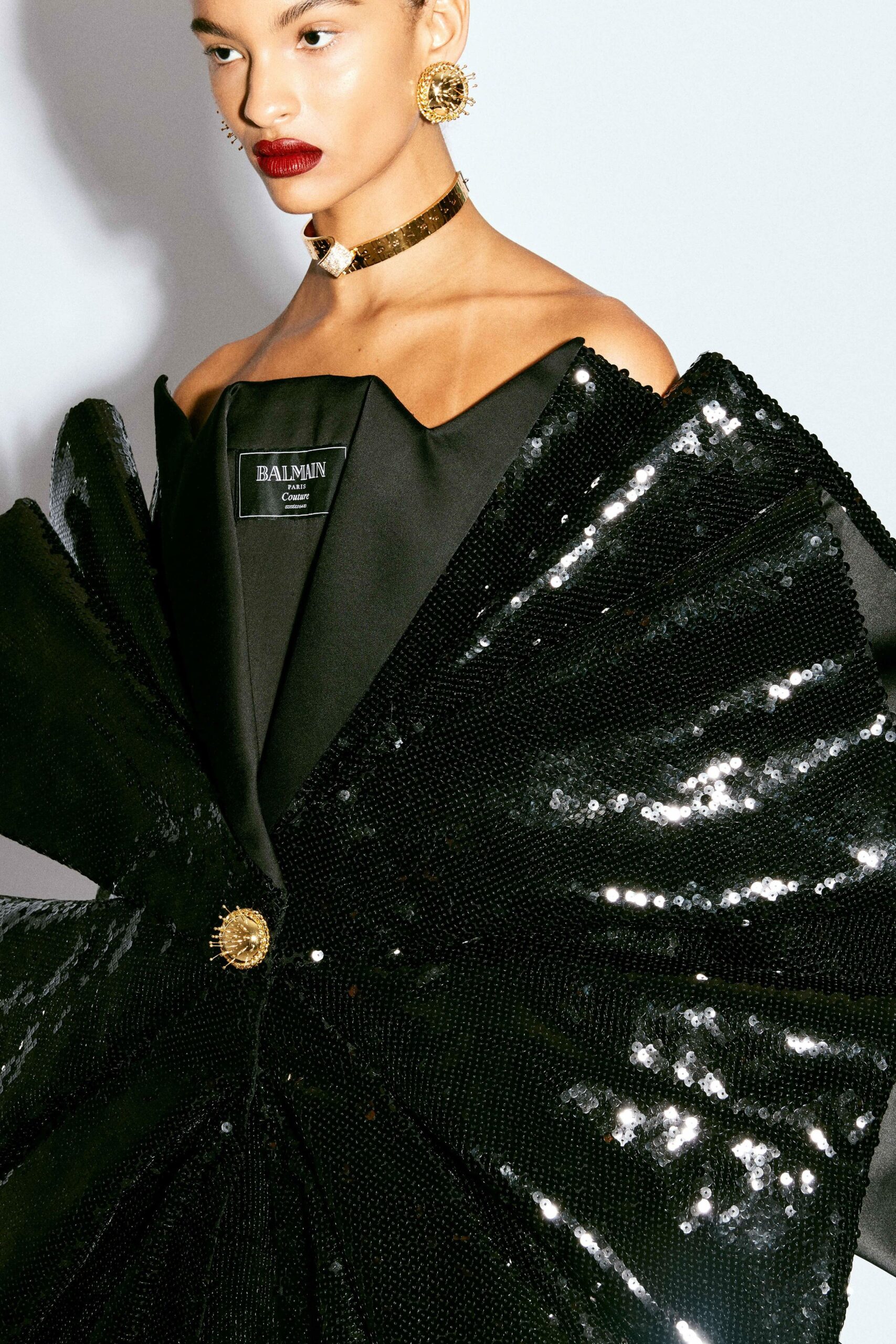 black sequin strapless gown
