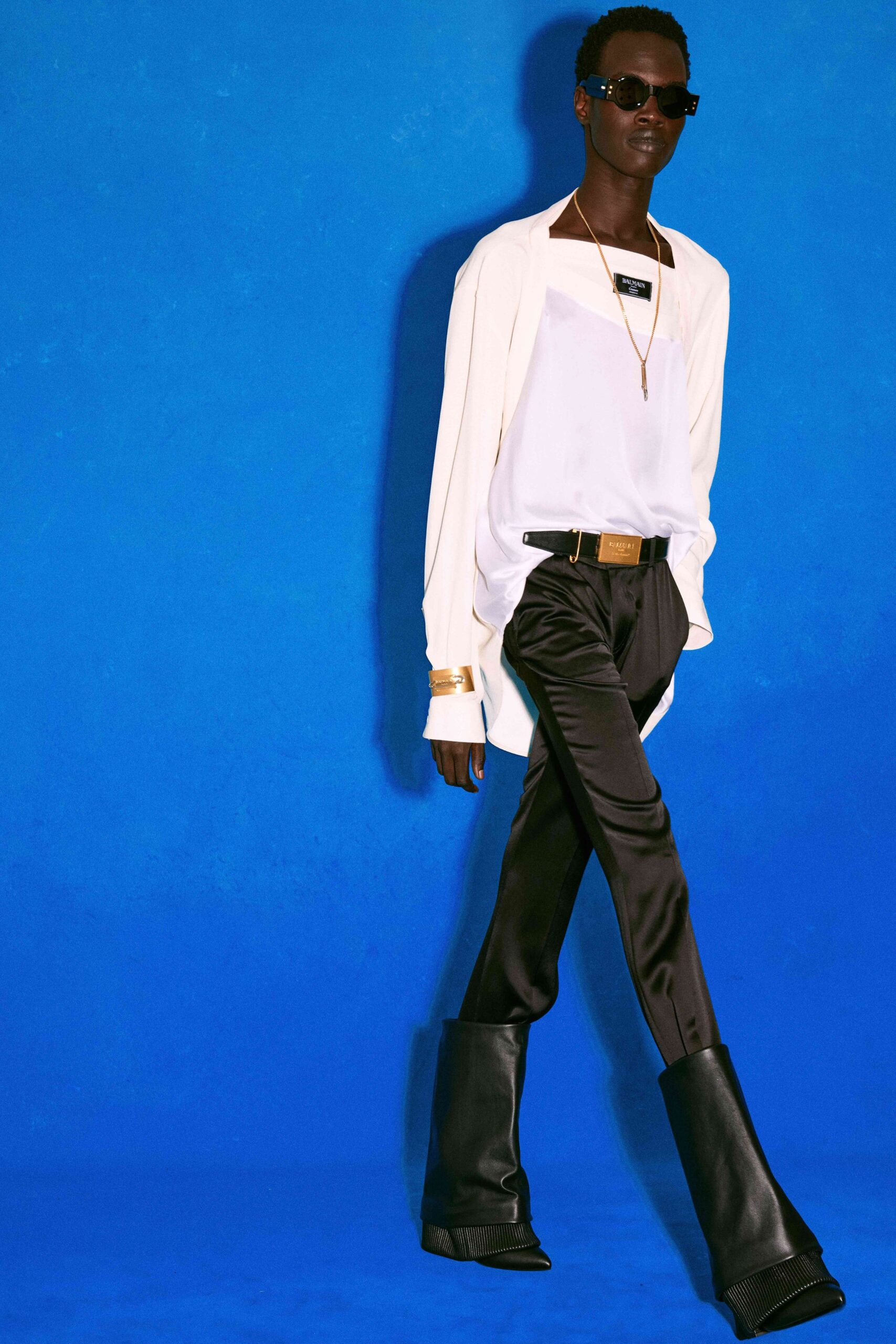 white relaxed shirt with black pants