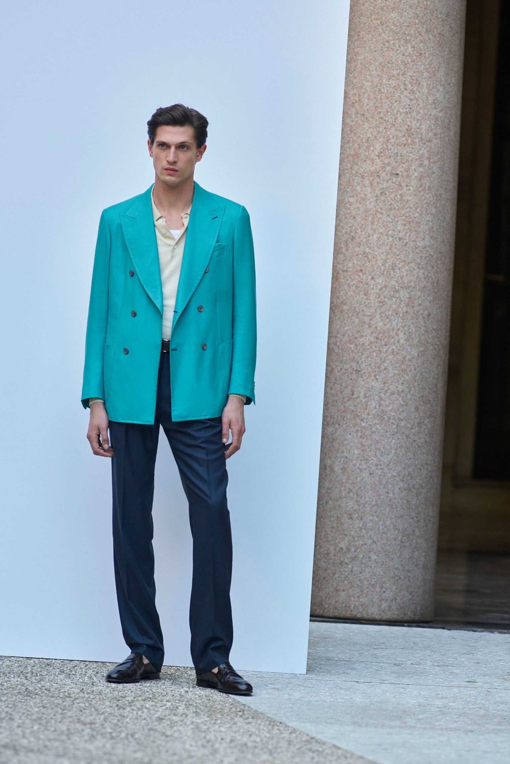 teal tailored blazer with beige shirt
