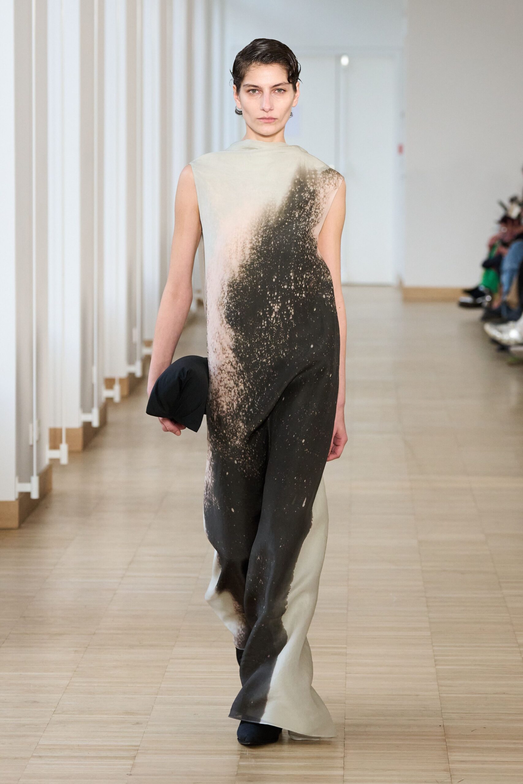 black and beige draped maxi dress with bag