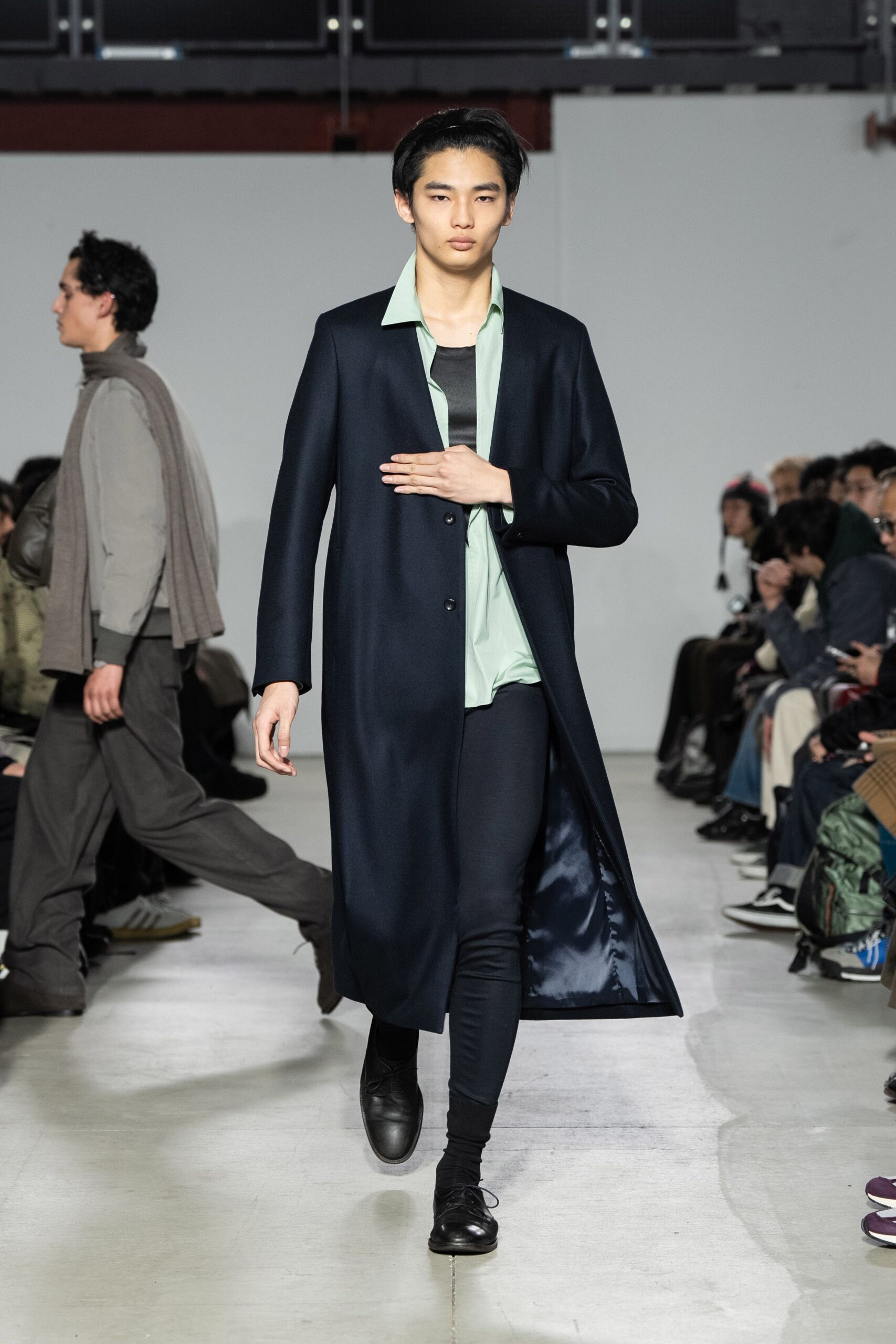 black wool coat with green shirt
