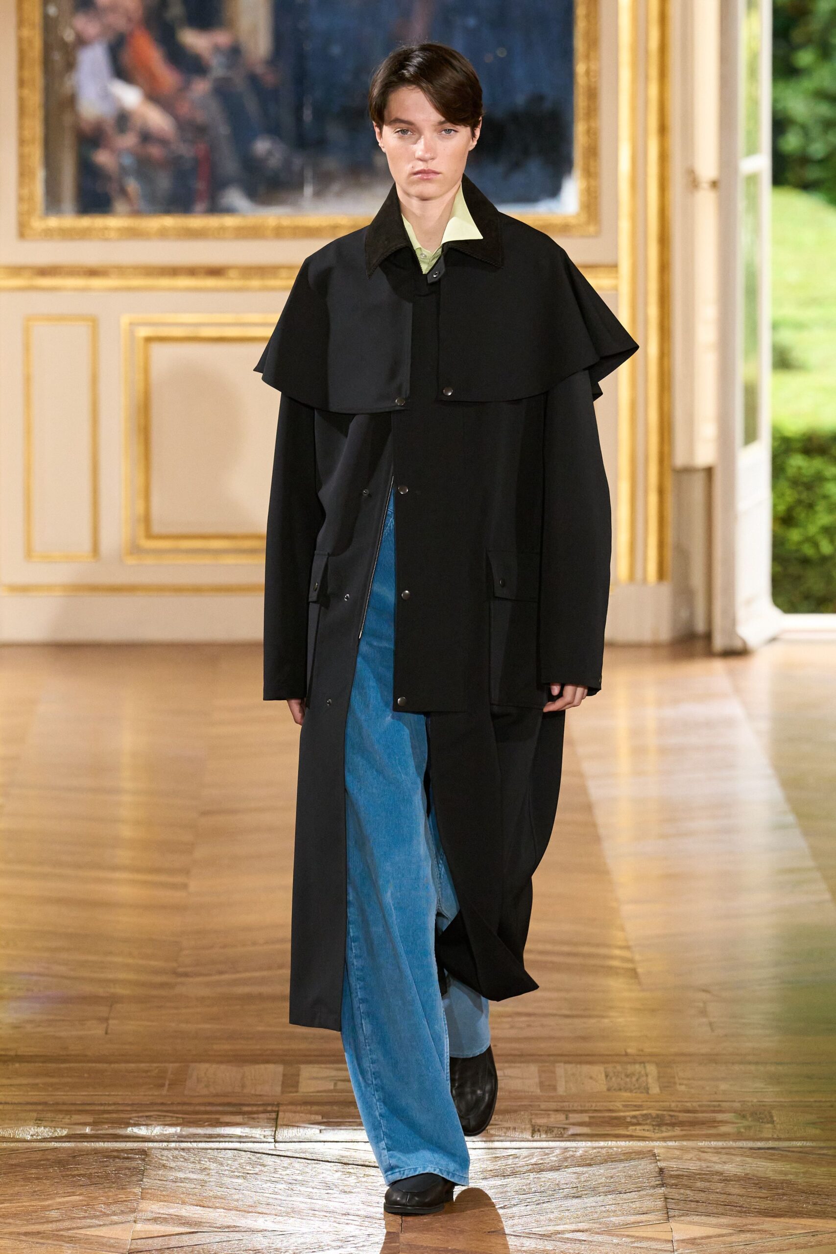 black coat with blue pants