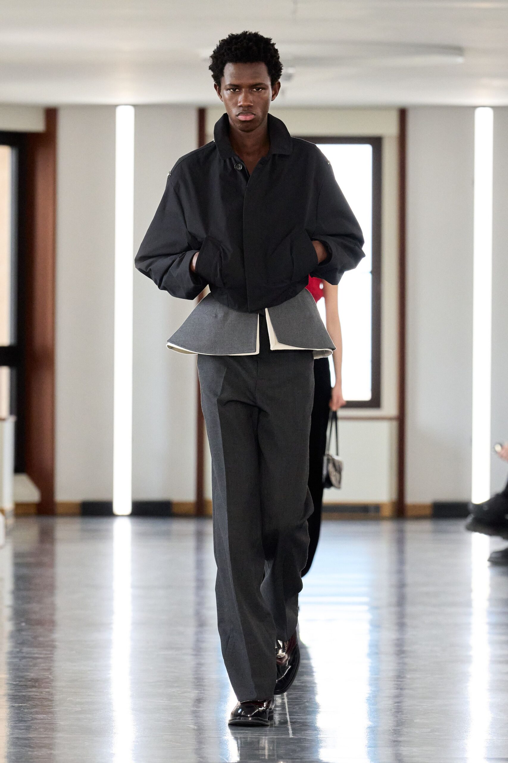 black relaxed jacket gray tailored pants