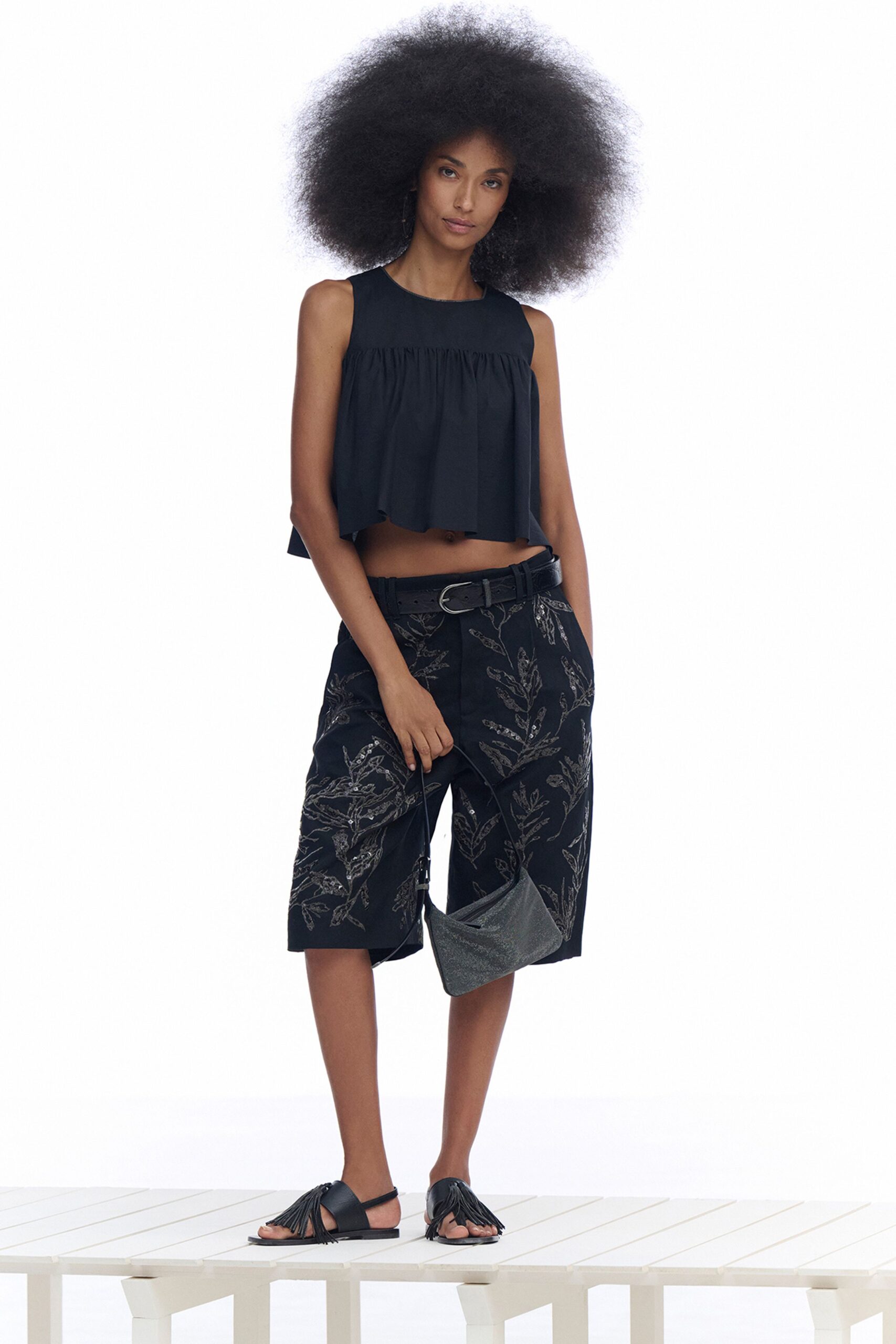 black cotton sleeveless high-neck fitted layered cropped top
