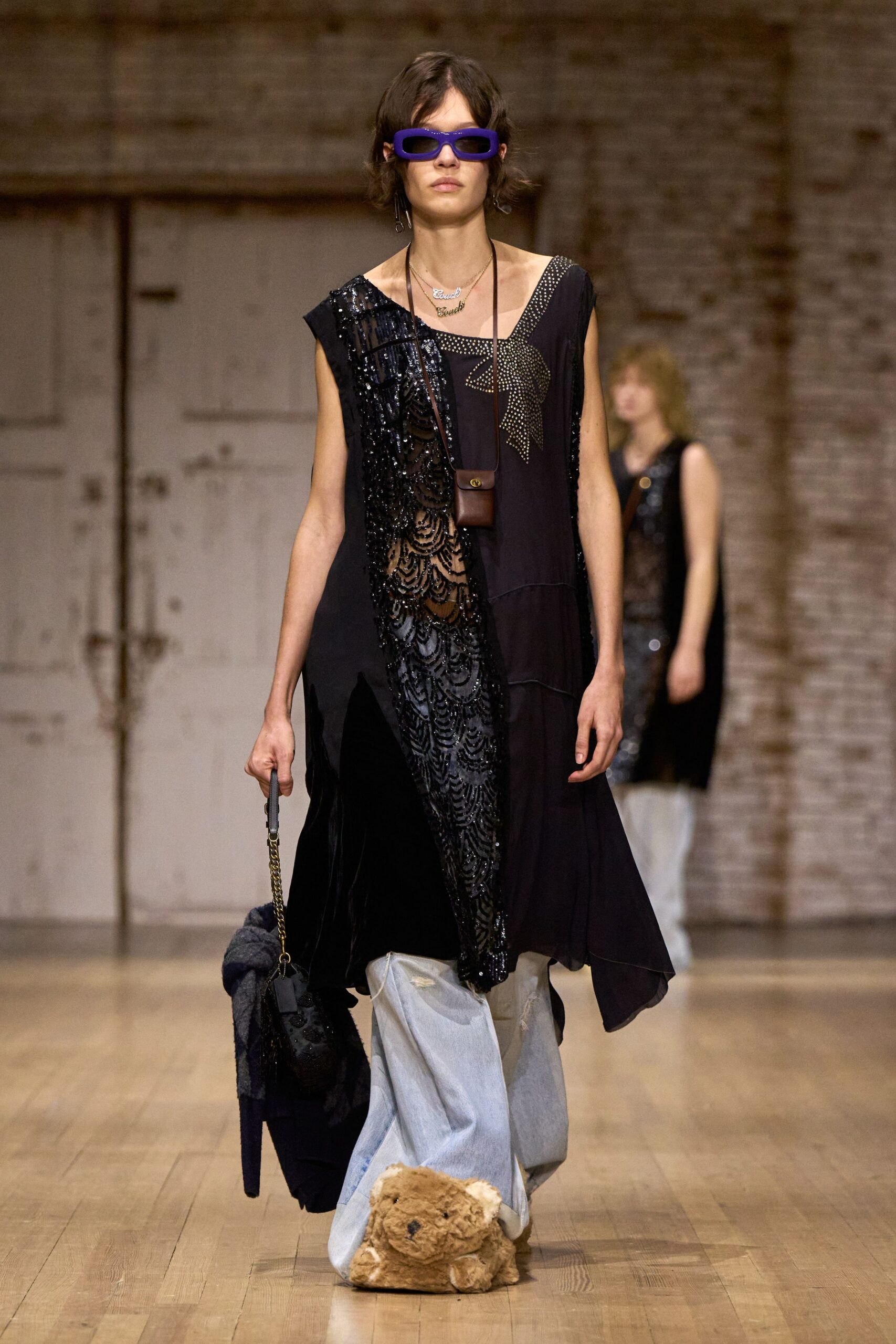 black layered dress with denim pants