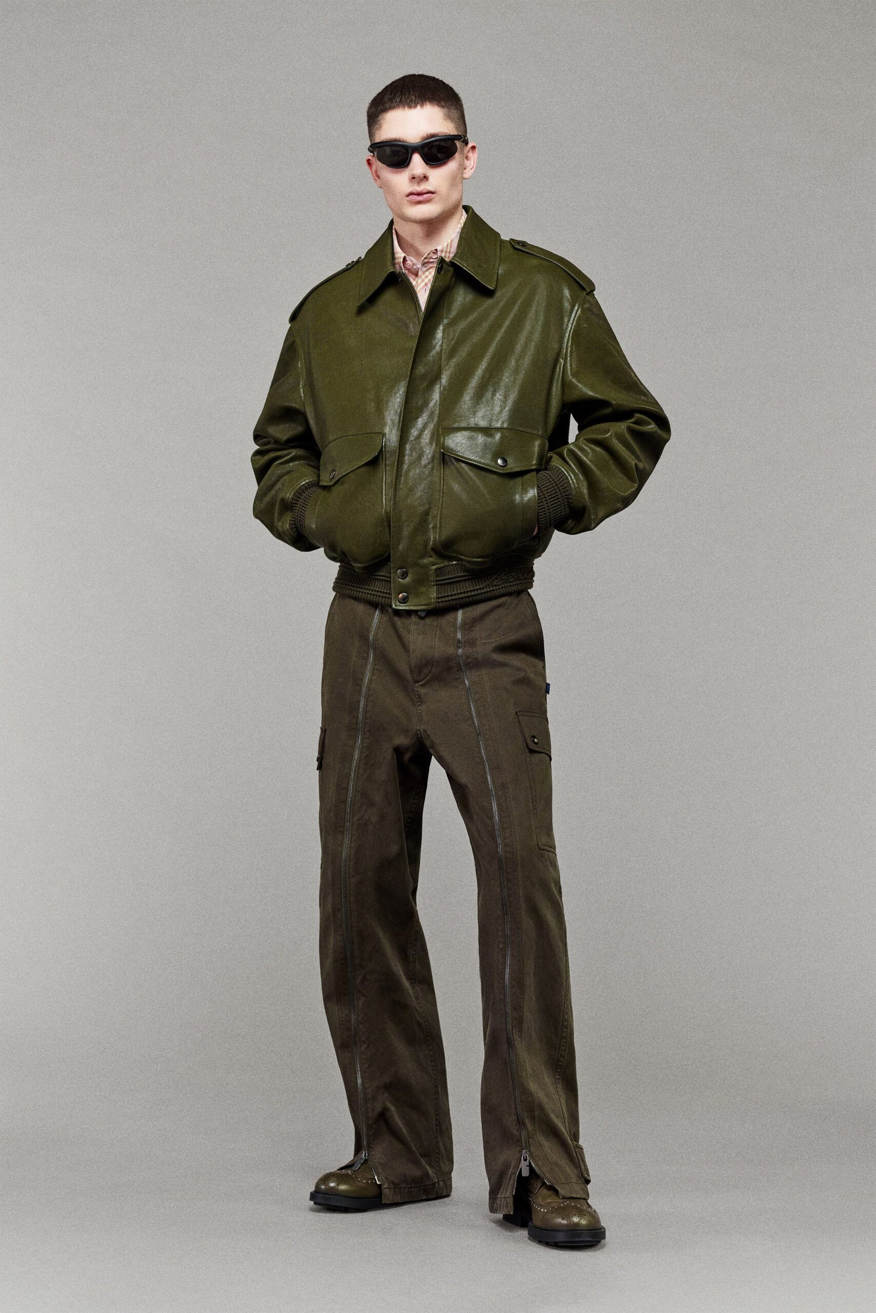 green leather jacket with cargo pants