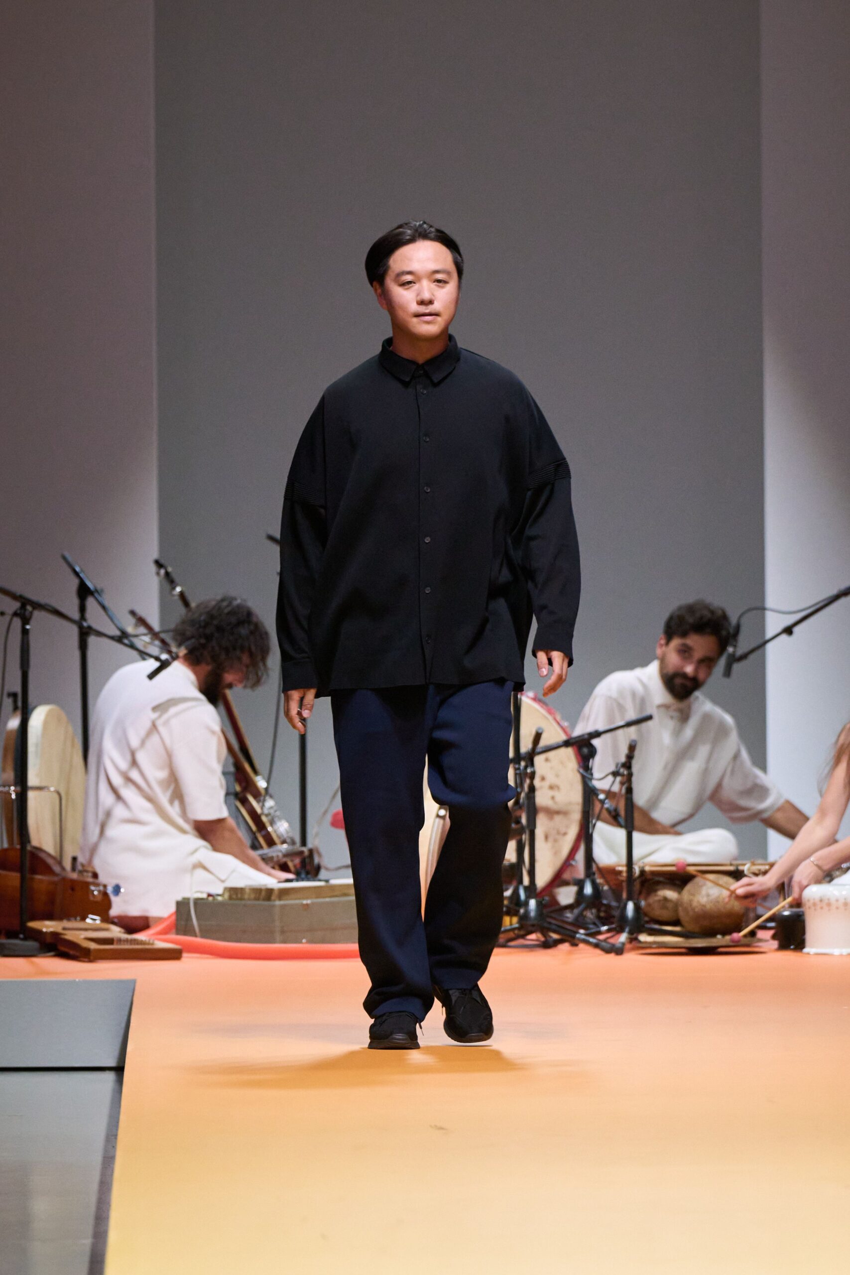 black oversized shirt with blue pants
