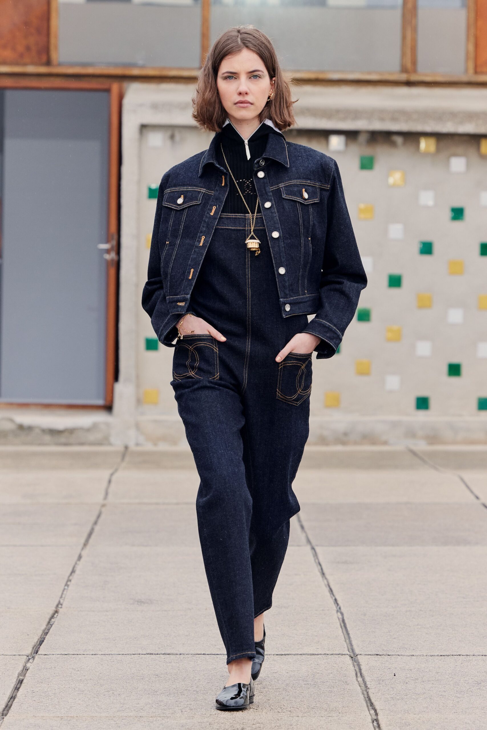 blue denim sleeveless collared fitted pockets jumpsuit