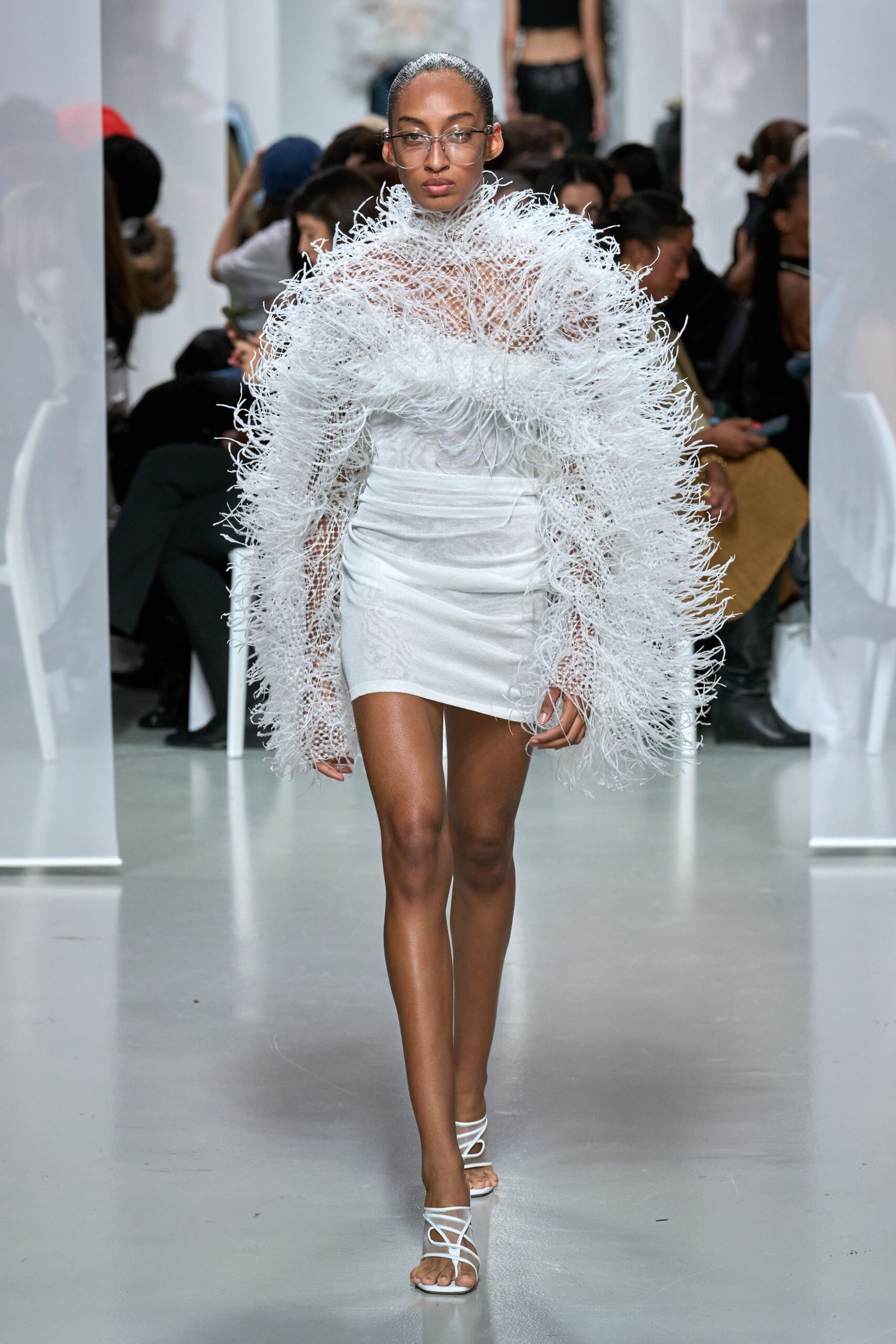 white silk sleeveless v-neck fitted fringed flowing dress