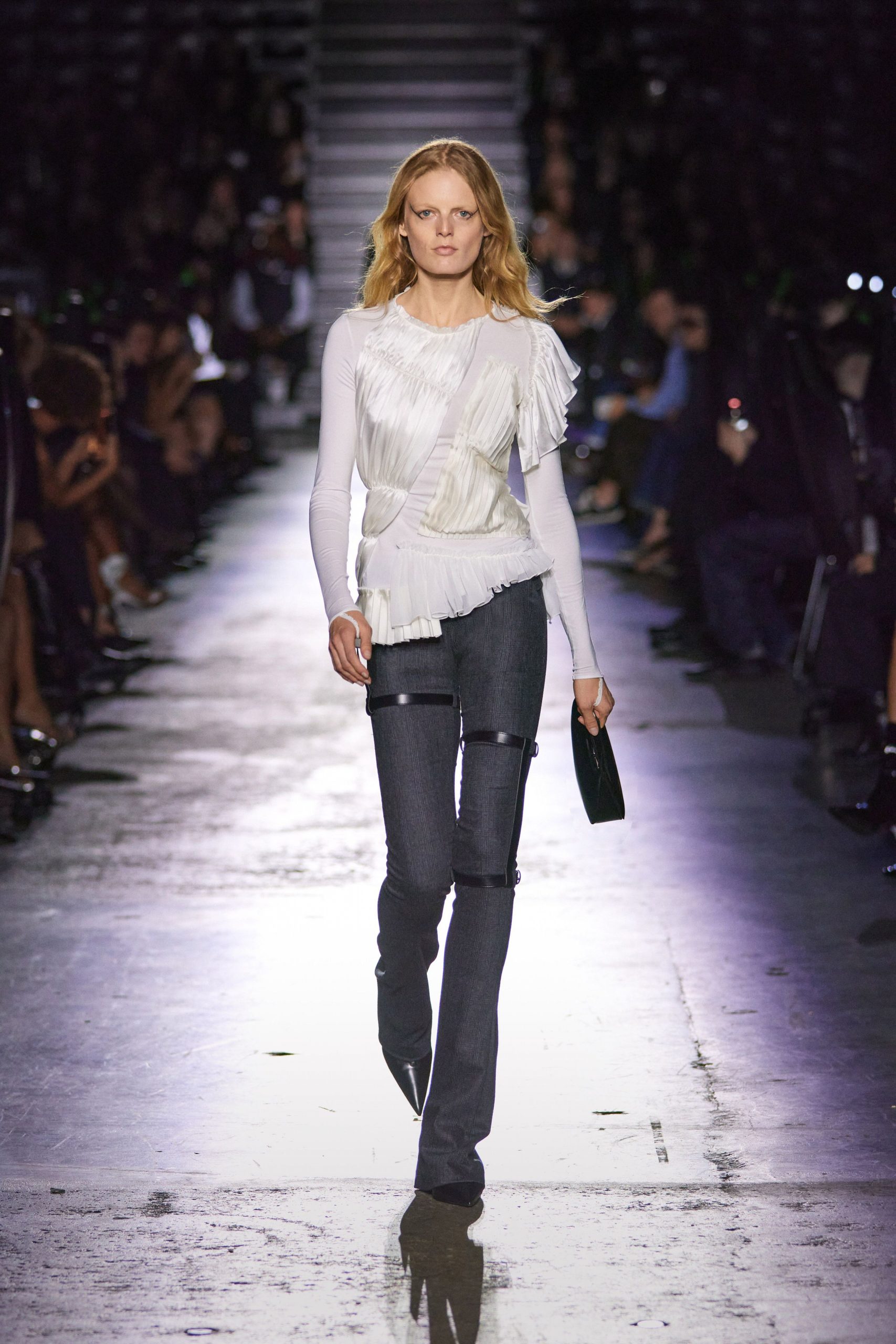 white ruffled top with jeans