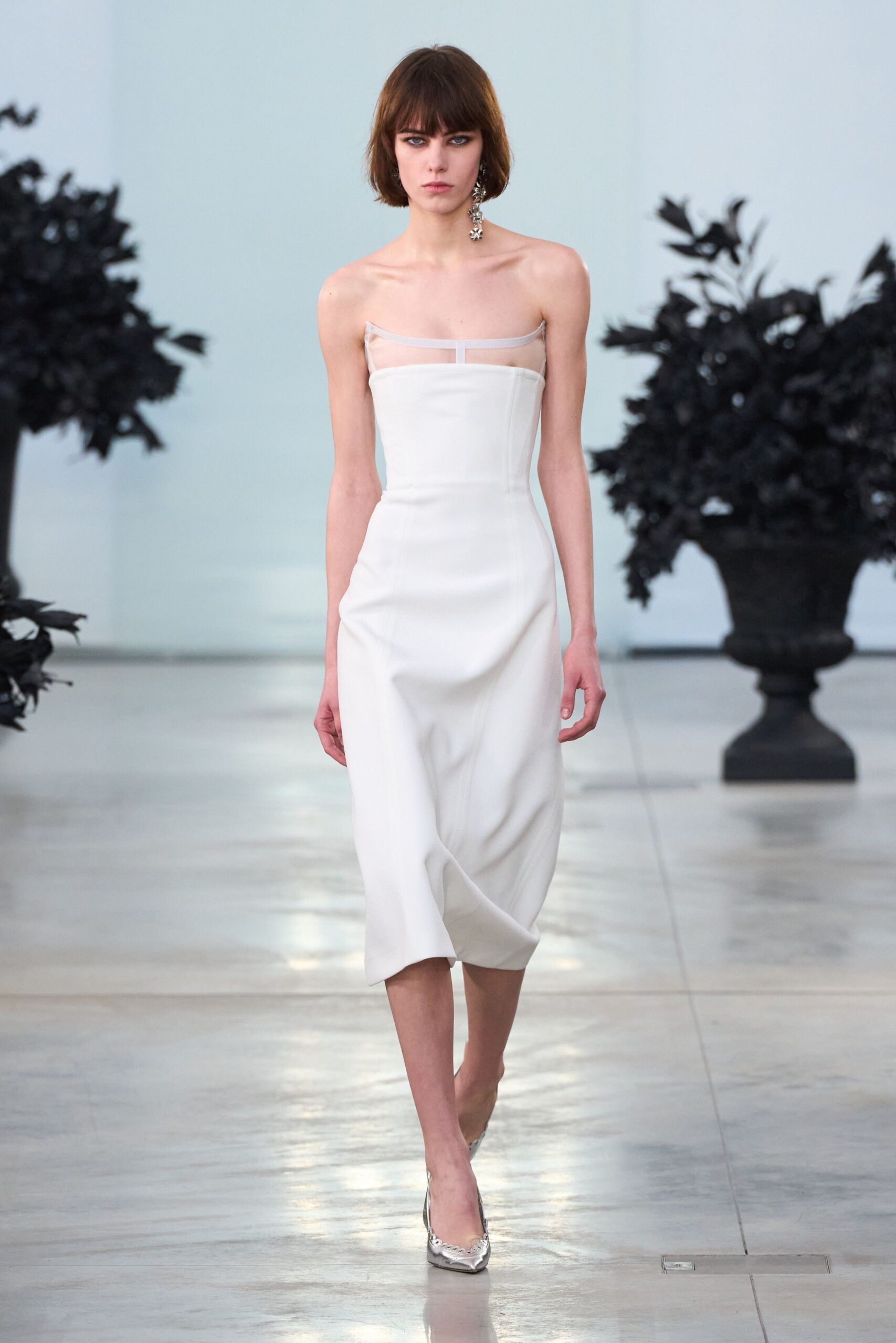 white silk sleeveless v-neck fitted structured shiny dress